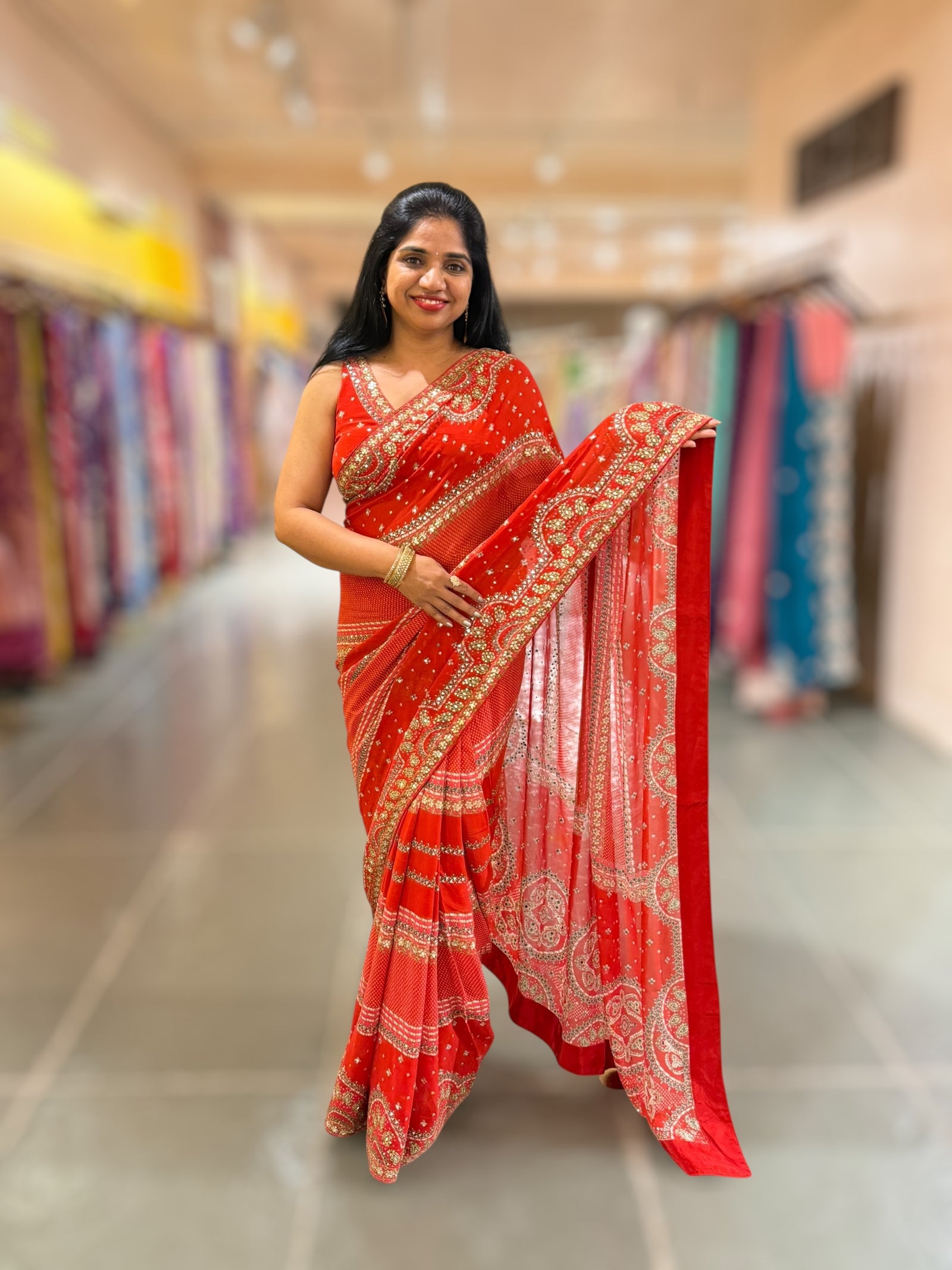 Orangish Red Kareena Inspired Gorgette Saree with allover mirrors
