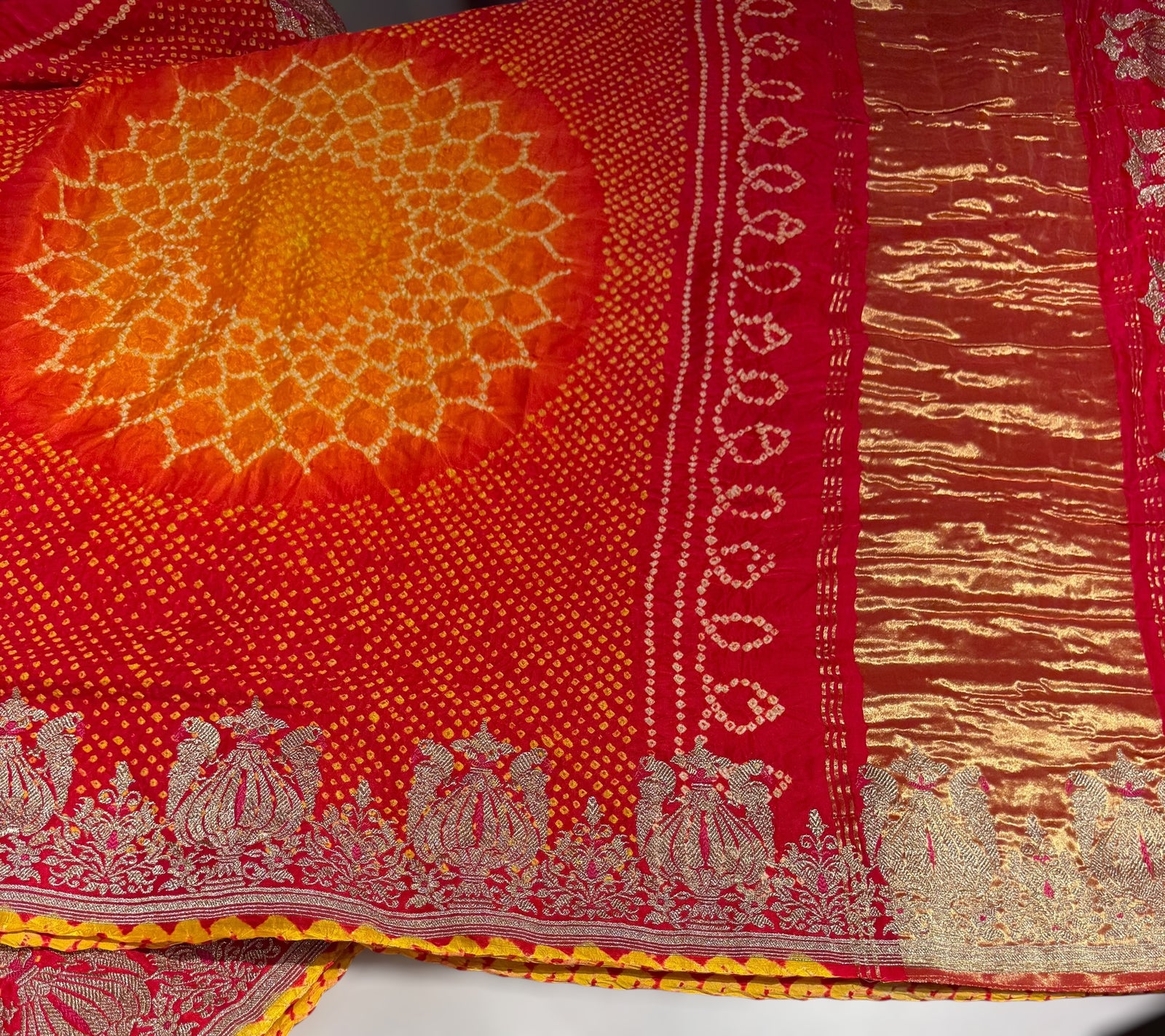 Orangish Red Designer Rai Bandhej Saree With Embroidered Border
