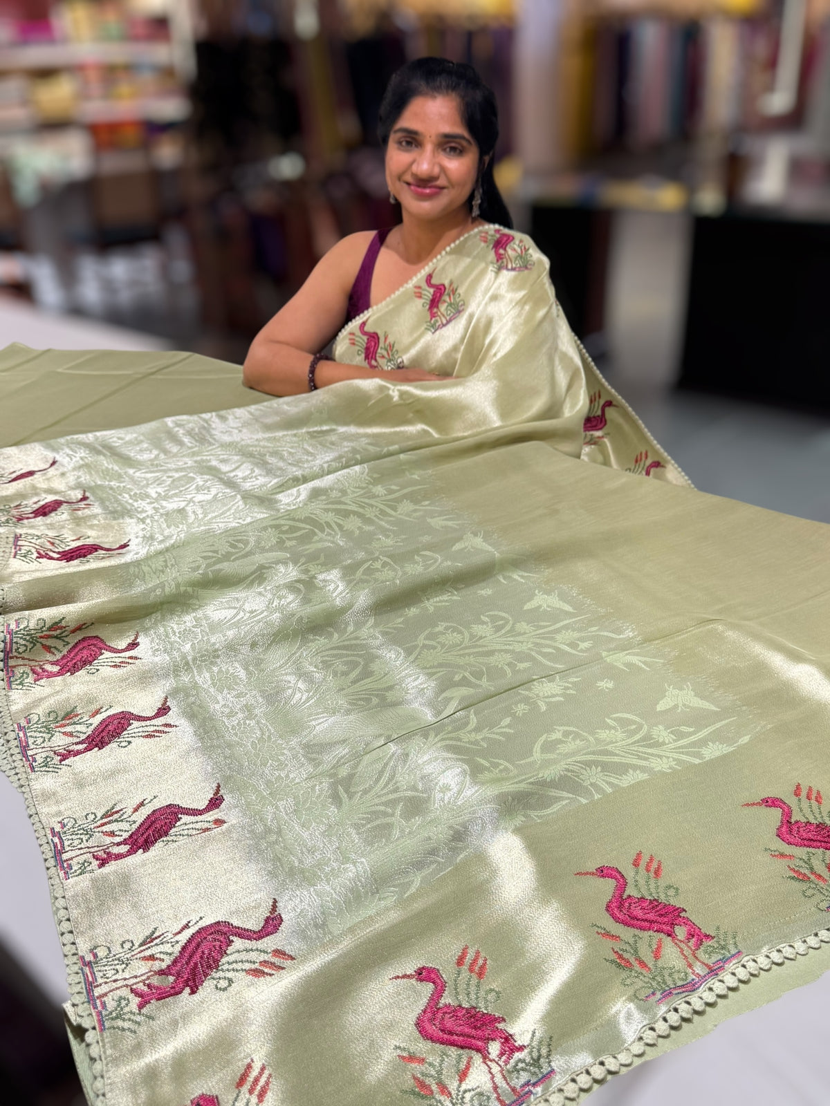 Mint Green Banarasi Brocade tissue saree with tonchui style weaving &amp; petite point embroidered swan border