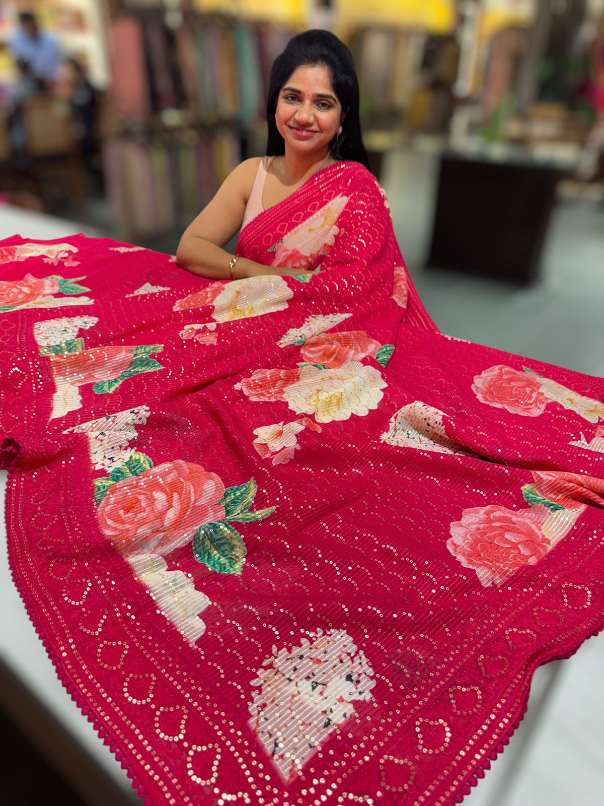 Reddish Pink georgette sequence saree with statement floral print