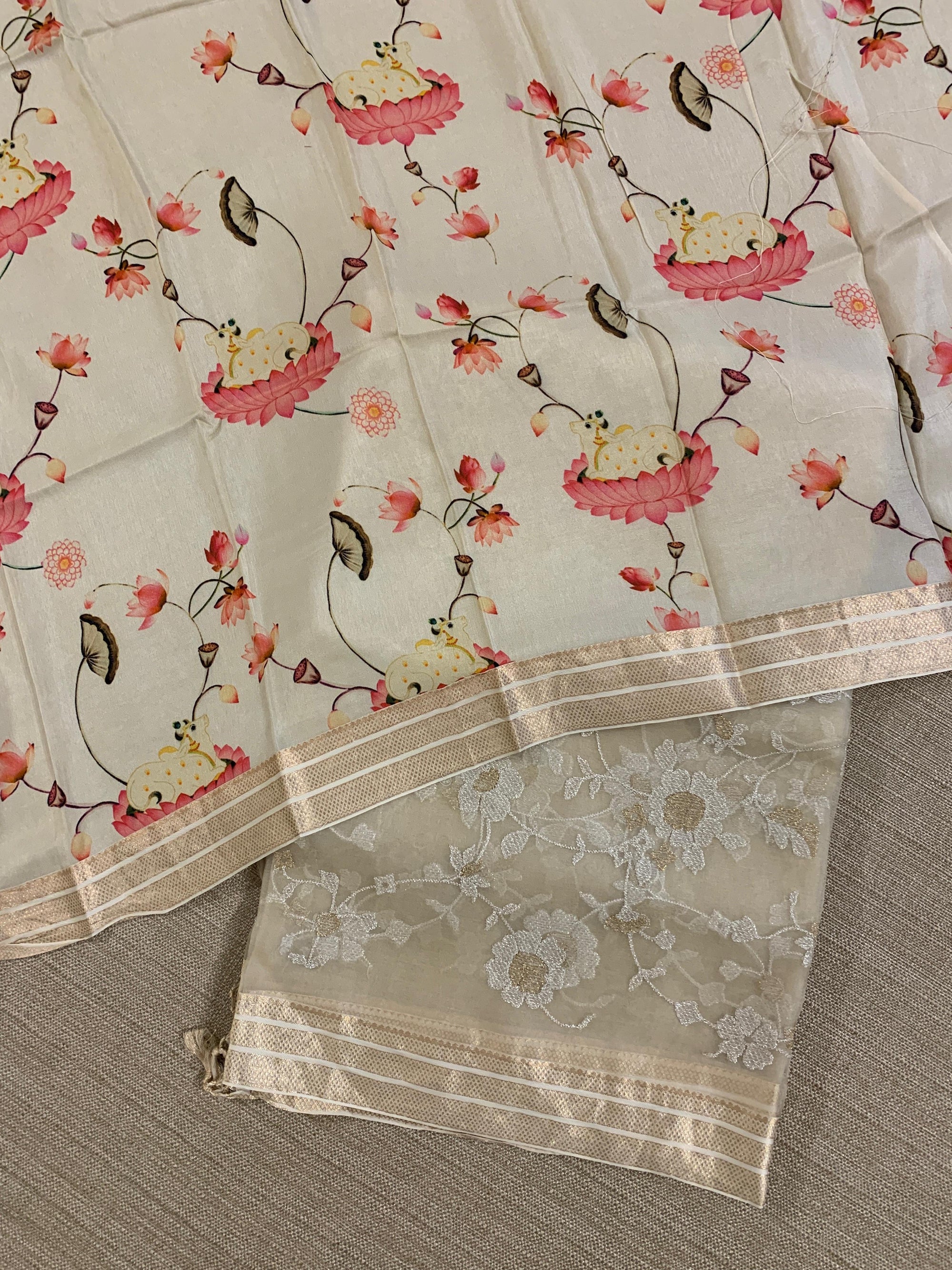 Beige Muslin allover embroidered Saree with pichwai printed blosue