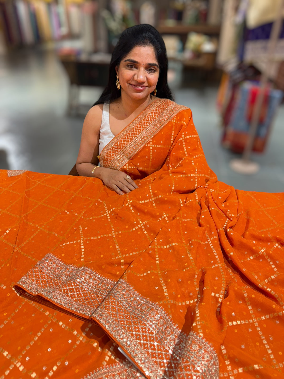Orange Fancy Banarasi Bandhini georgette saree with sabhyasachi borders and blouse