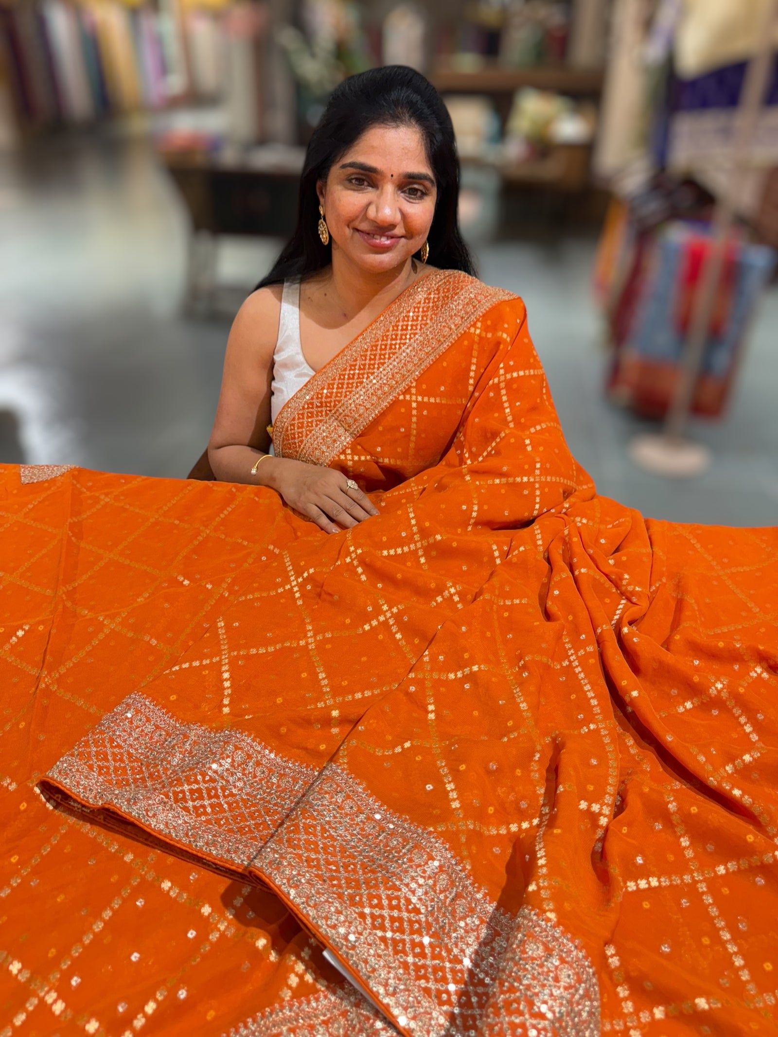 Orange Fancy Banarasi Bandhini georgette saree with sabhyasachi borders and blouse