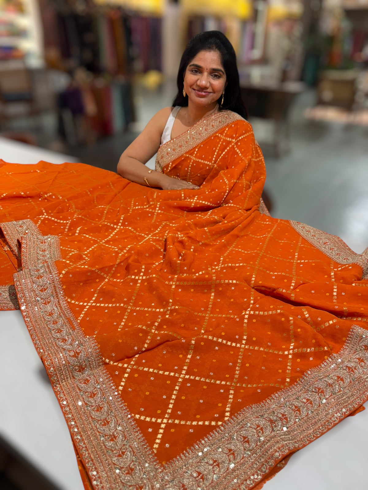 Orange Fancy Banarasi Bandhini georgette saree with sabhyasachi borders and blouse