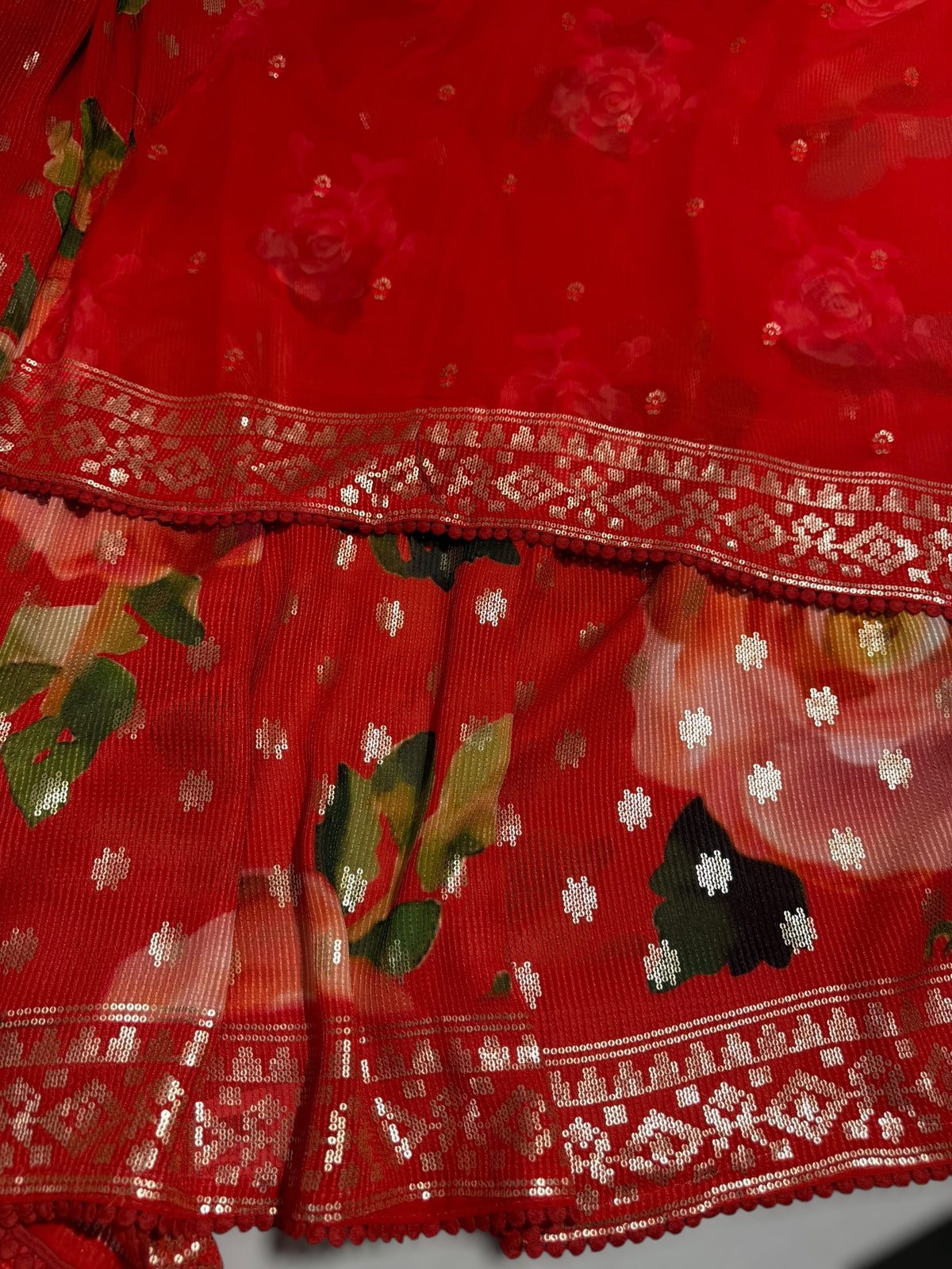 Red georgette sequence saree with statement floral print