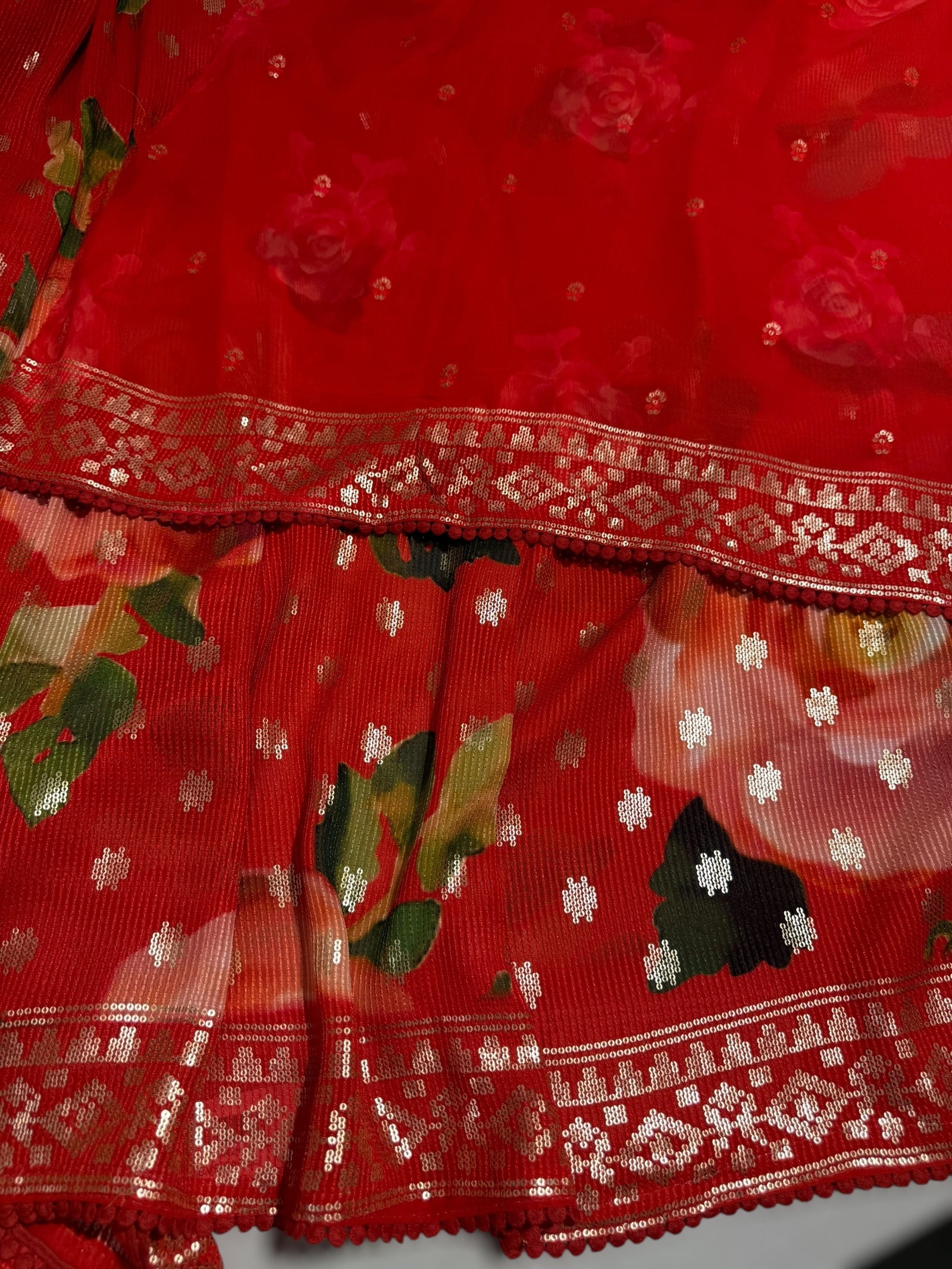 Red georgette sequence saree with statement floral print