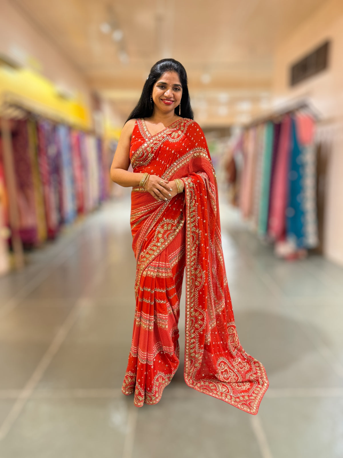 Orangish Red Kareena Inspired Gorgette Saree with allover mirrors