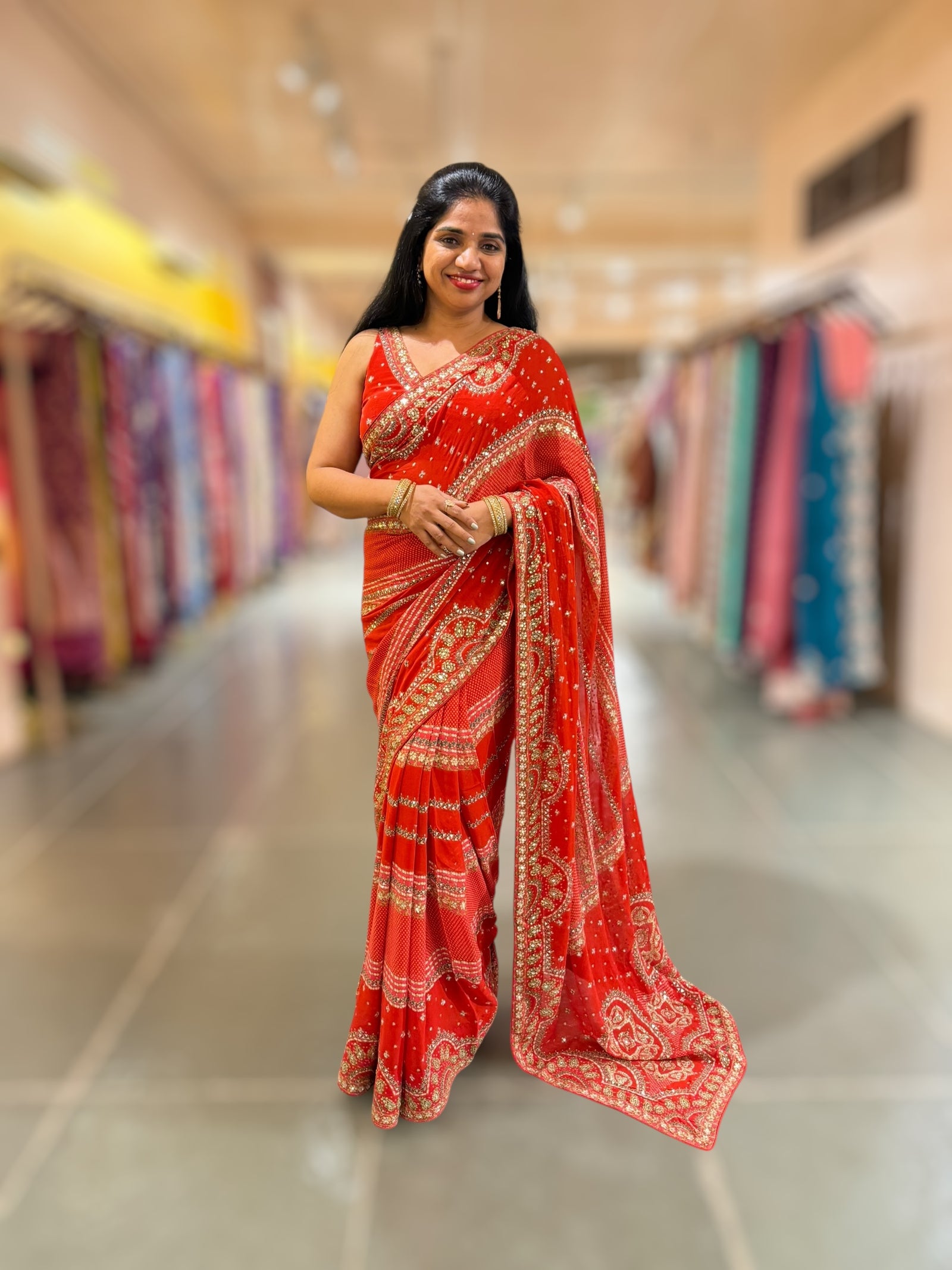 Orangish Red Kareena Inspired Gorgette Saree with allover mirrors