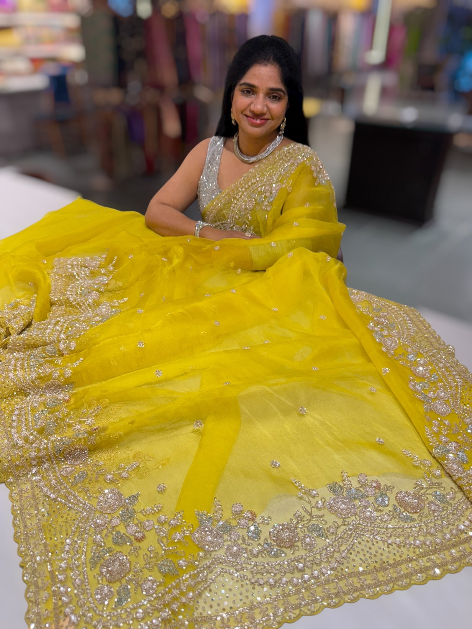 Lemon Yellow Organza Silk Saree with heavy intricate handwork