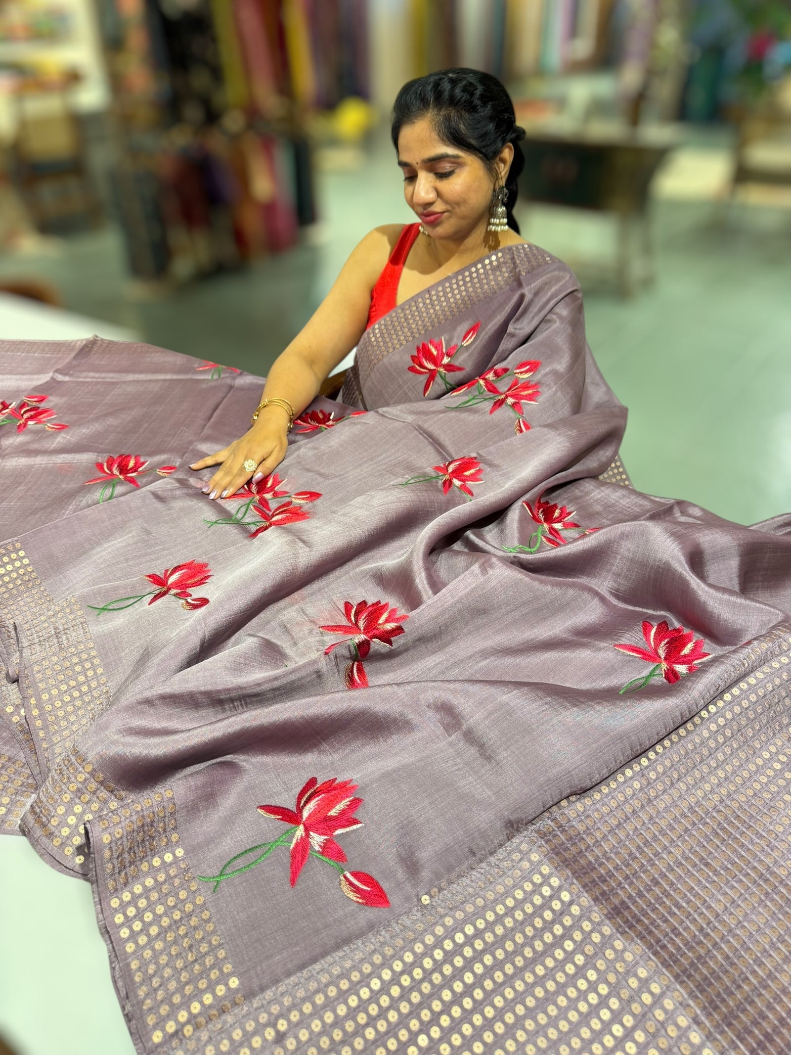 Mauve pure handloom tussar byloom saree with lotus embroidered bunch motifs
