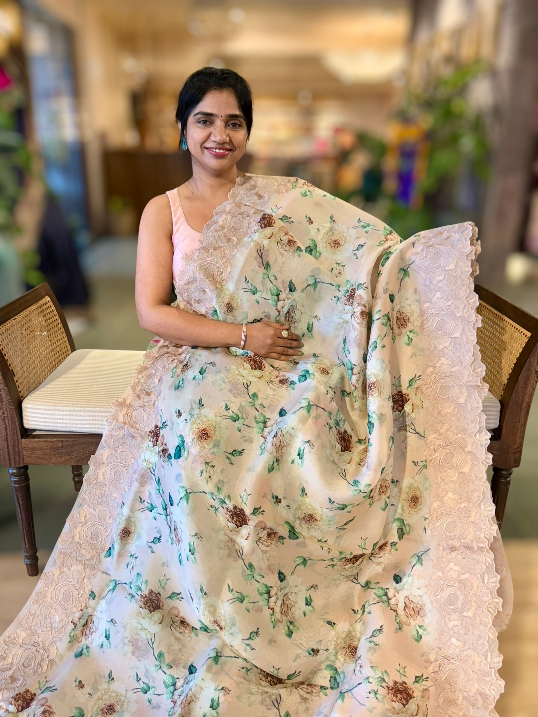 Nude Printed Organza Saree With Chantilly Lace Style Embroidered Border.