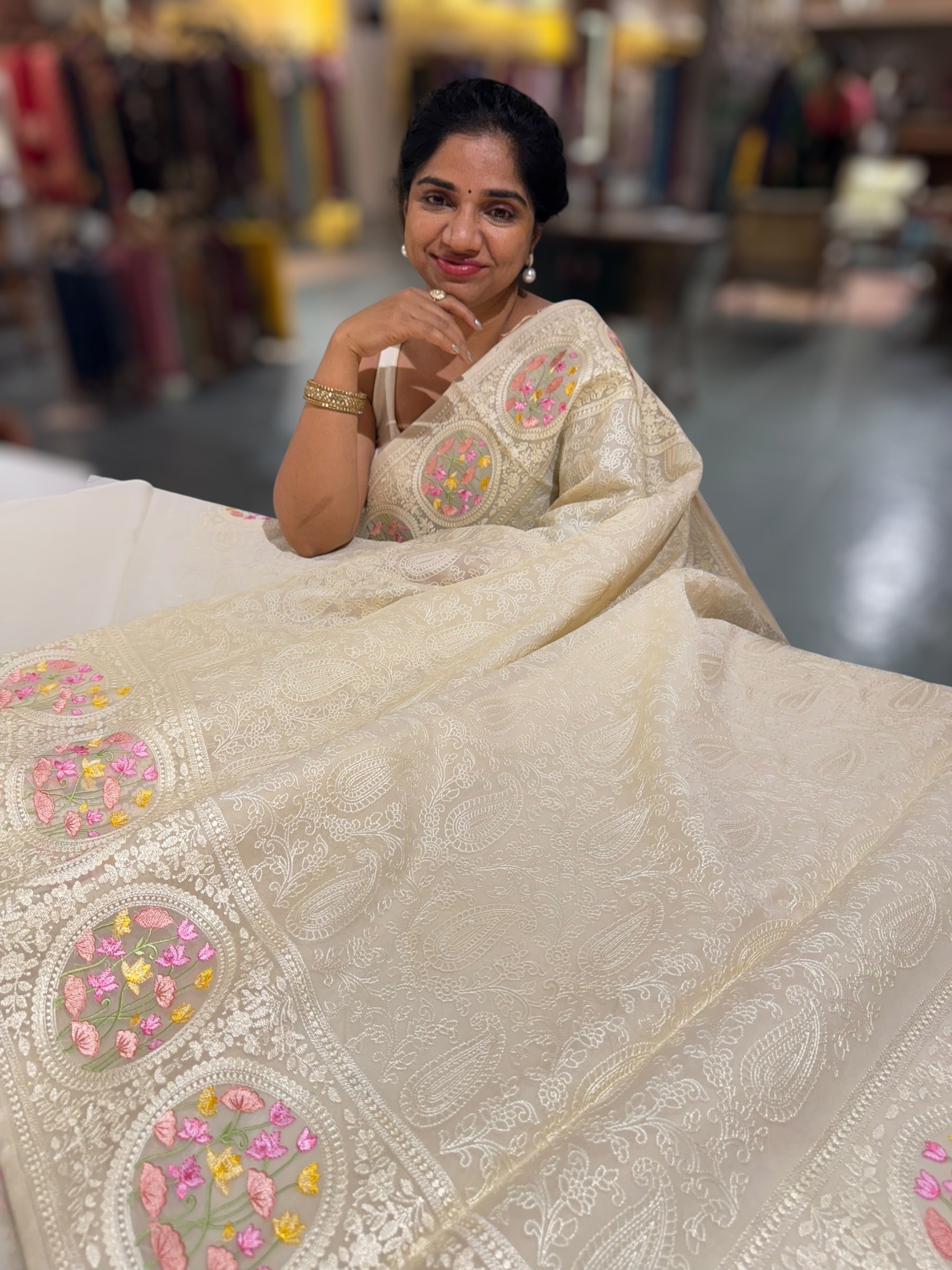 Ivory Organza Saree with allover Chikankari Embroidery and pichwai border