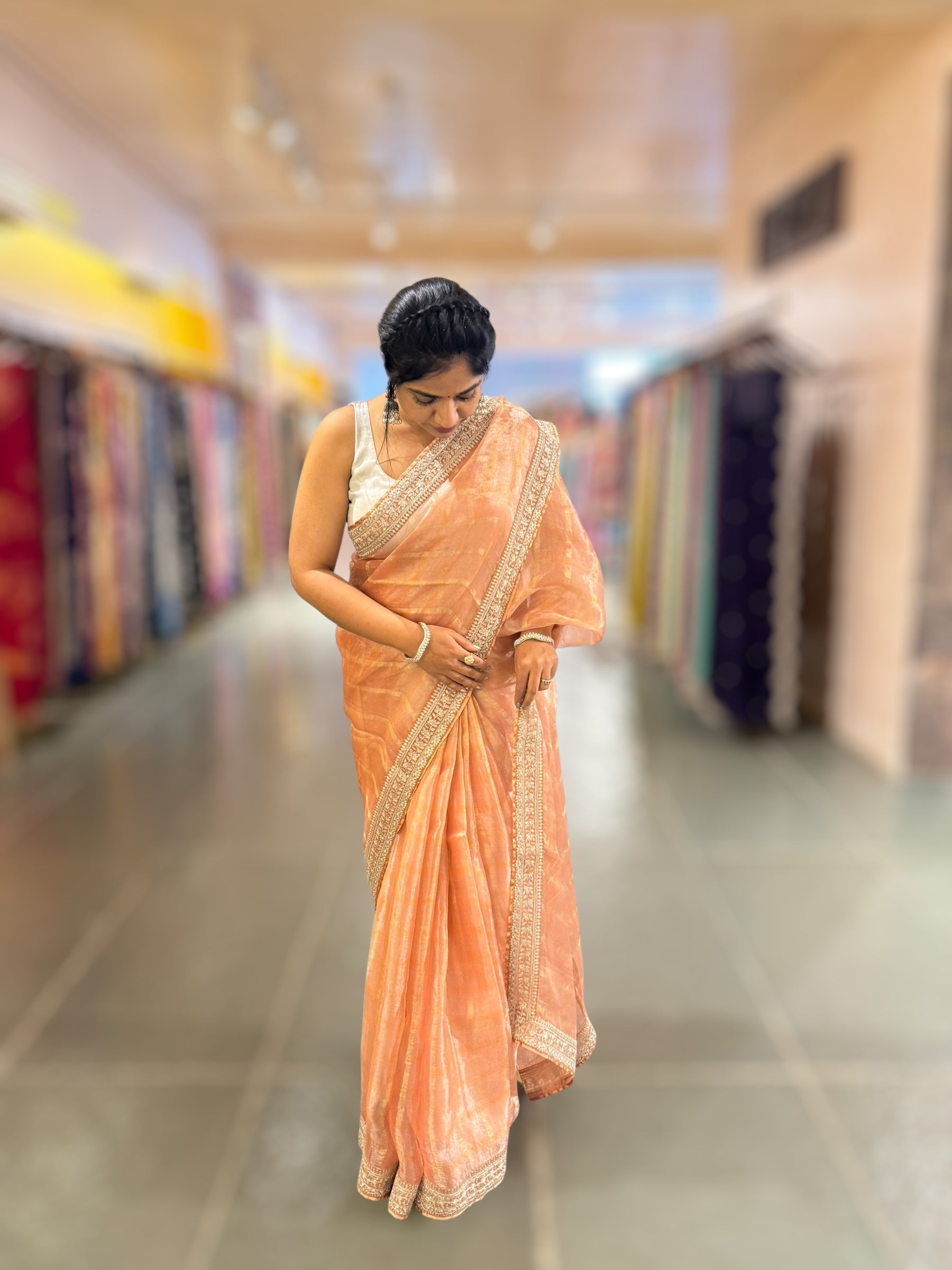 Peach Banarasi Tissue checks Saree with Sabyasachi Borders