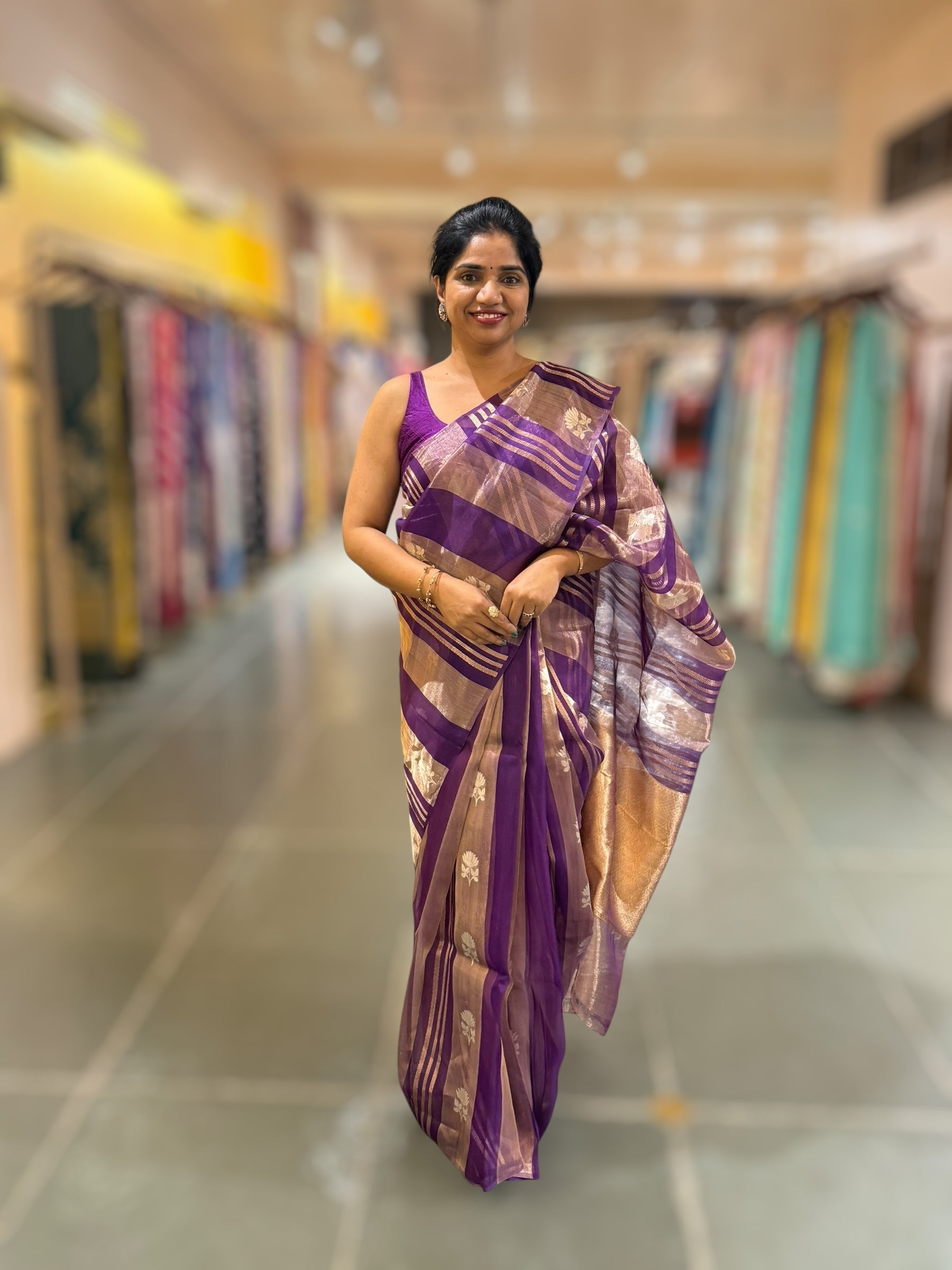 Purple Banarasi Handloom Kora Tissue Stripes with allover kaduwa woven lotus  motifs .