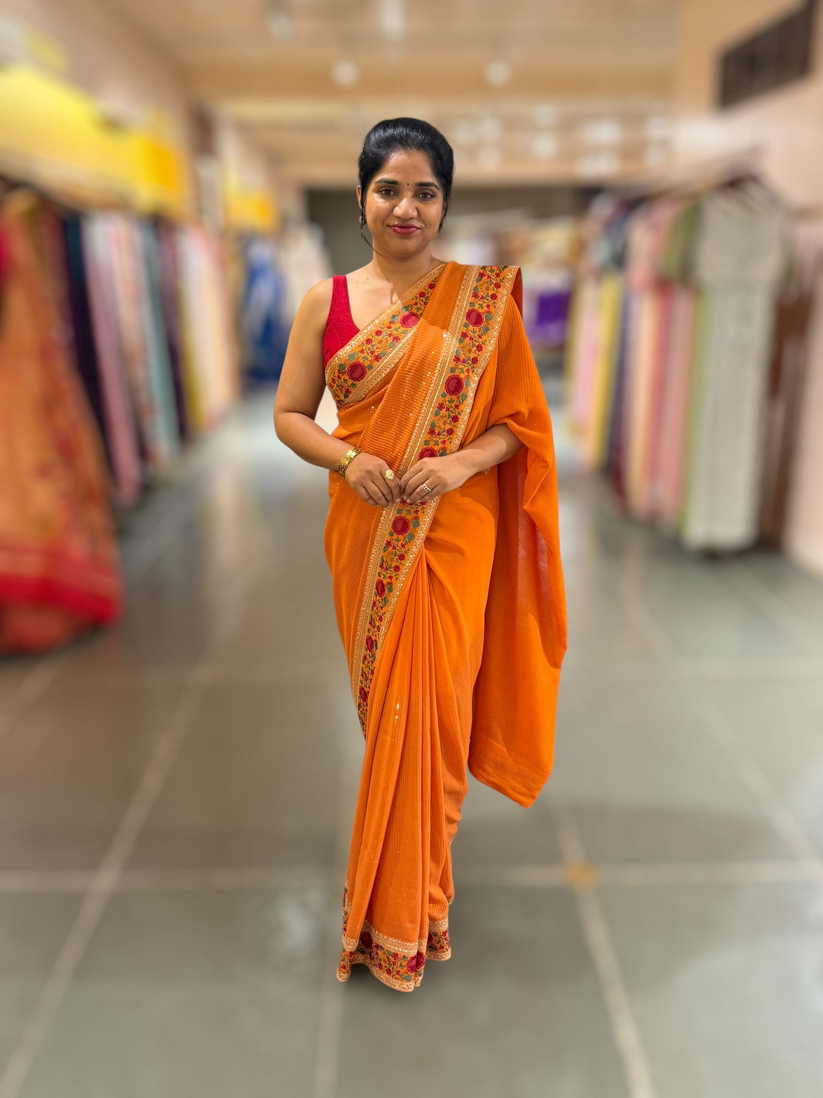 Orange Georgette sequnce Saree with Sabyasachi borders