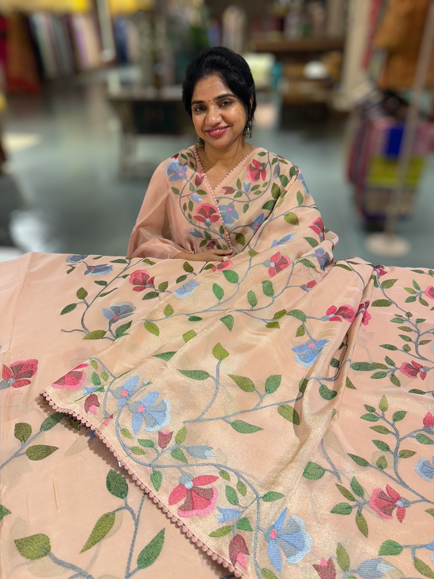 Peach Tissue georgette saree with allover jamdani inspired embroidery