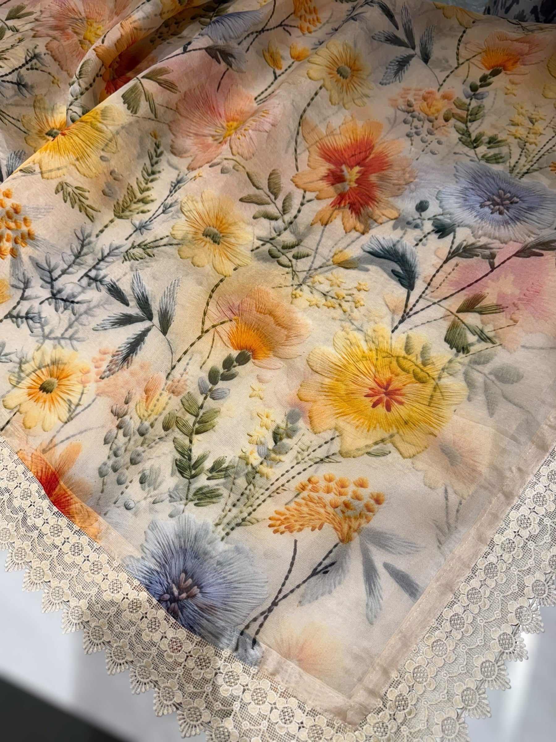 Beige Organza 3D floral Printed Saree hemlined with crotia lace