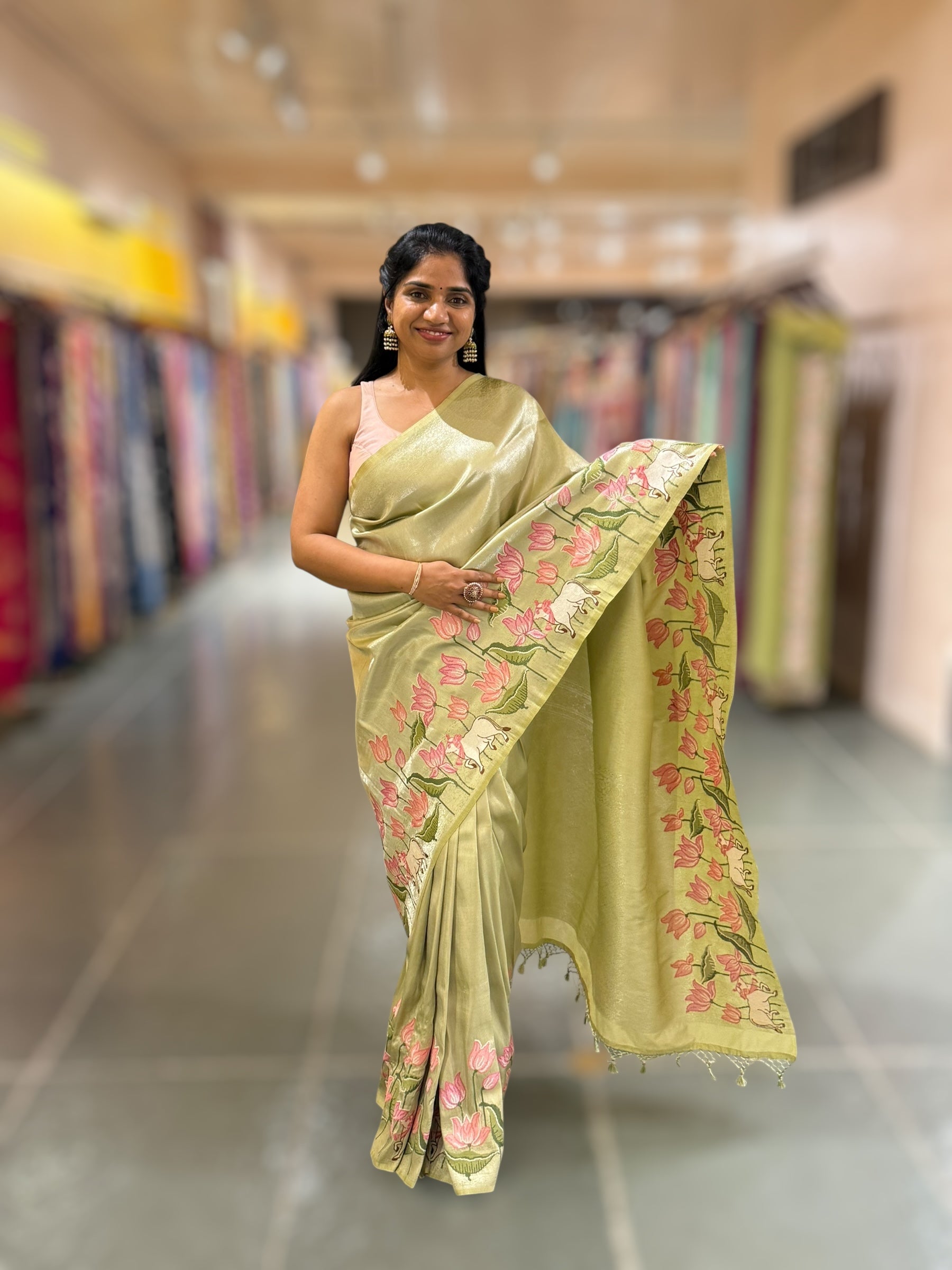 Pista Banarasi Brocade Saree with Pichwai Embroidered Skirt Border.
