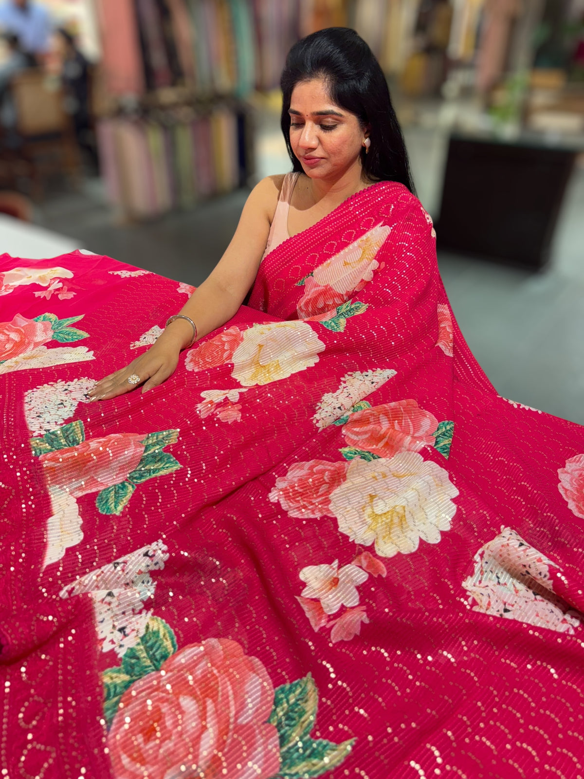 Reddish Pink georgette sequence saree with statement floral print