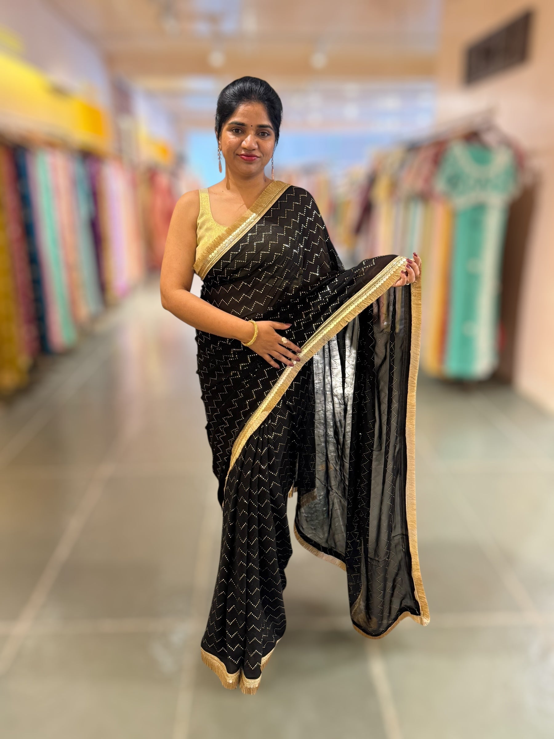 Black Georgette Saree with stick on Badla in zigzag pattern