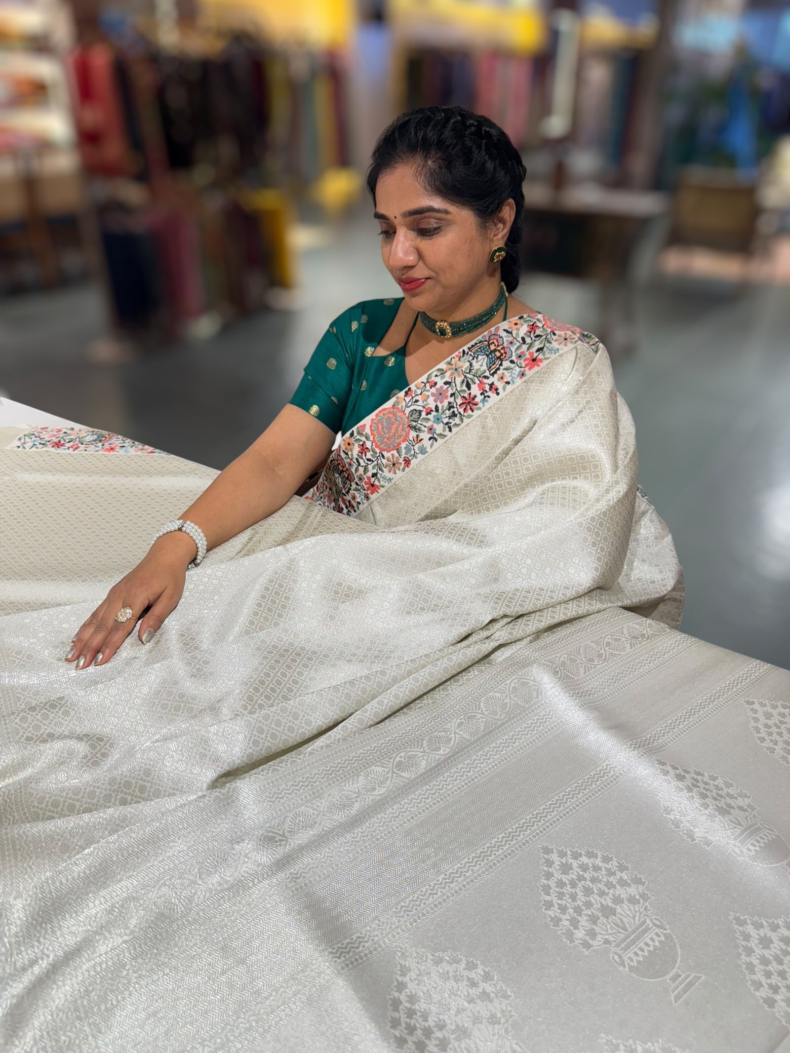 Half White Banarasi  brocade Silk Saree with Petite Point Embroidered Border.