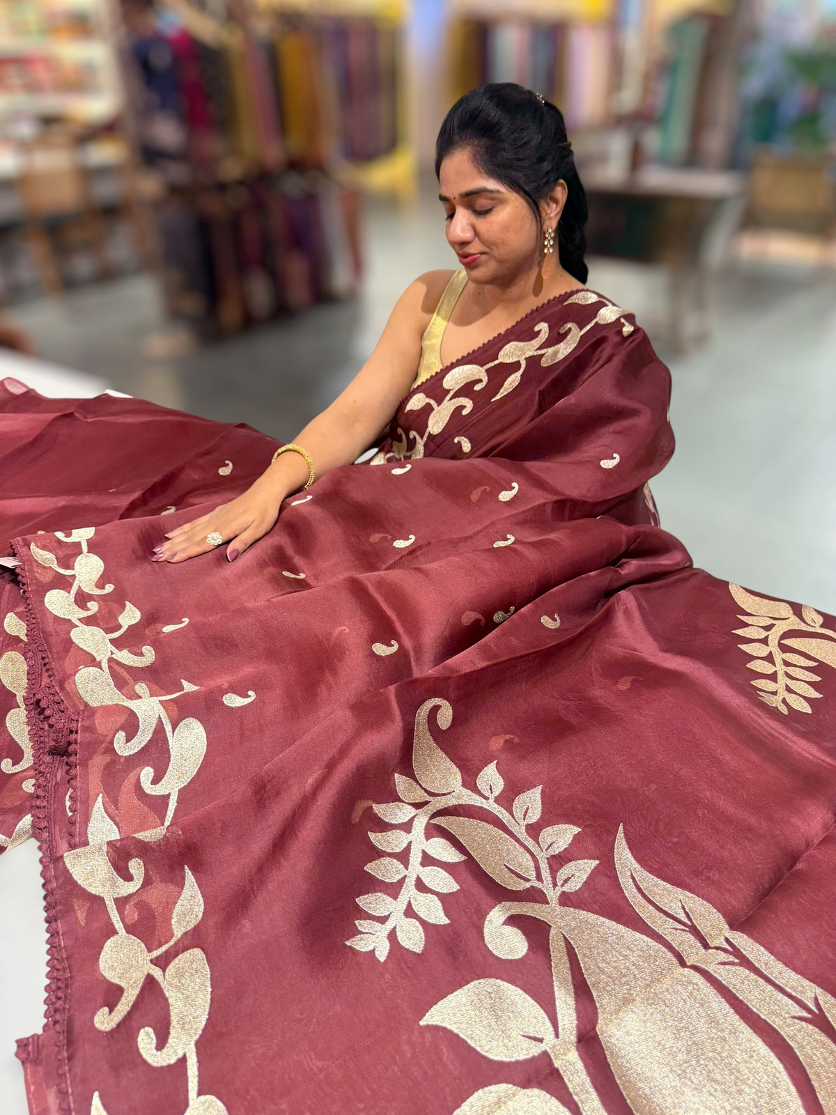 Meroonish Brown Organza Saree with stunning zari embroidered mango border and heavy designer pallu