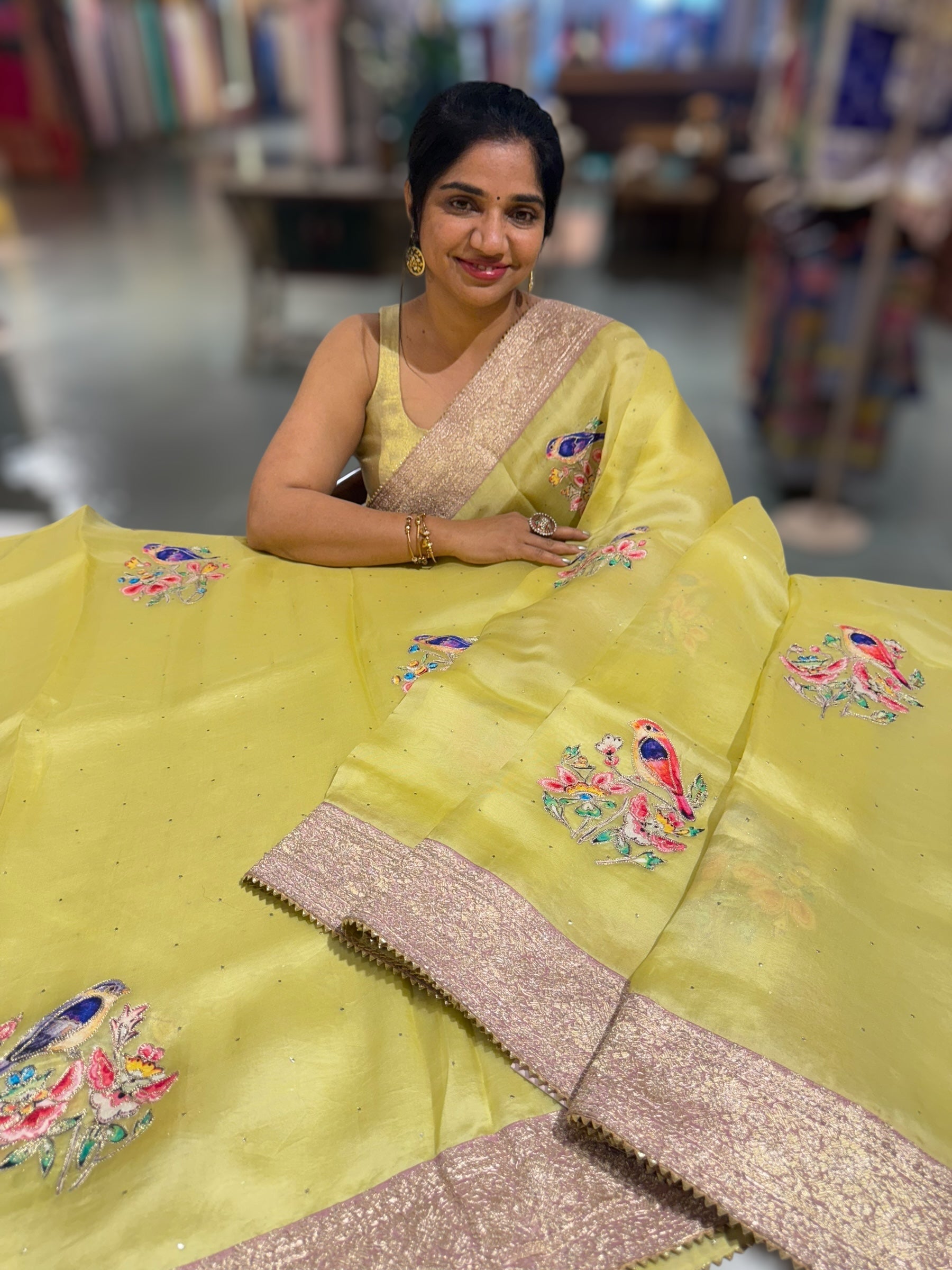 Lime yellow Pure Organza Saree with banarasi pitawork border and bird applique motifs allover the saree