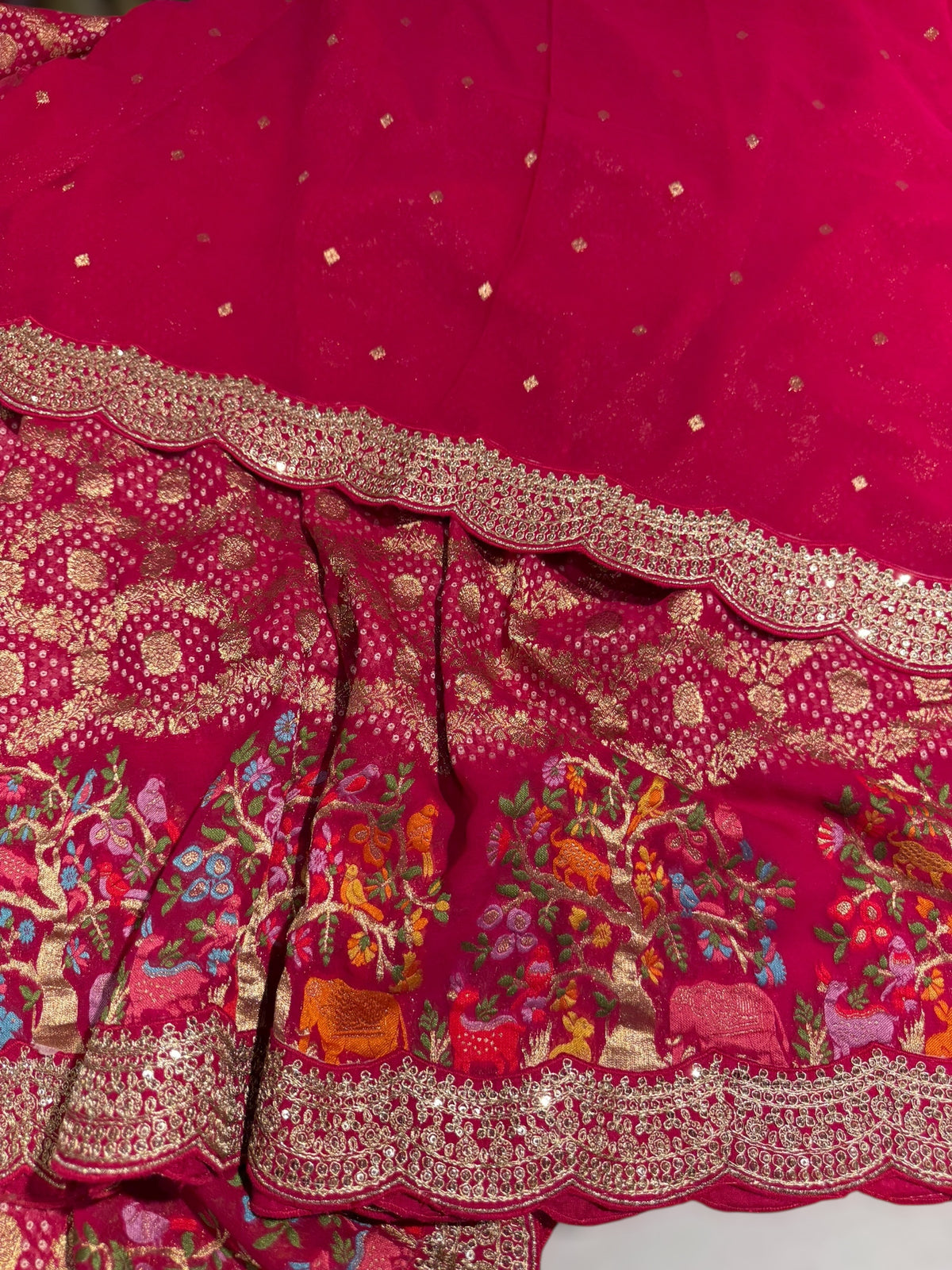 Reddish pink  Bandhini Georgette Saree with sabya style scallop border