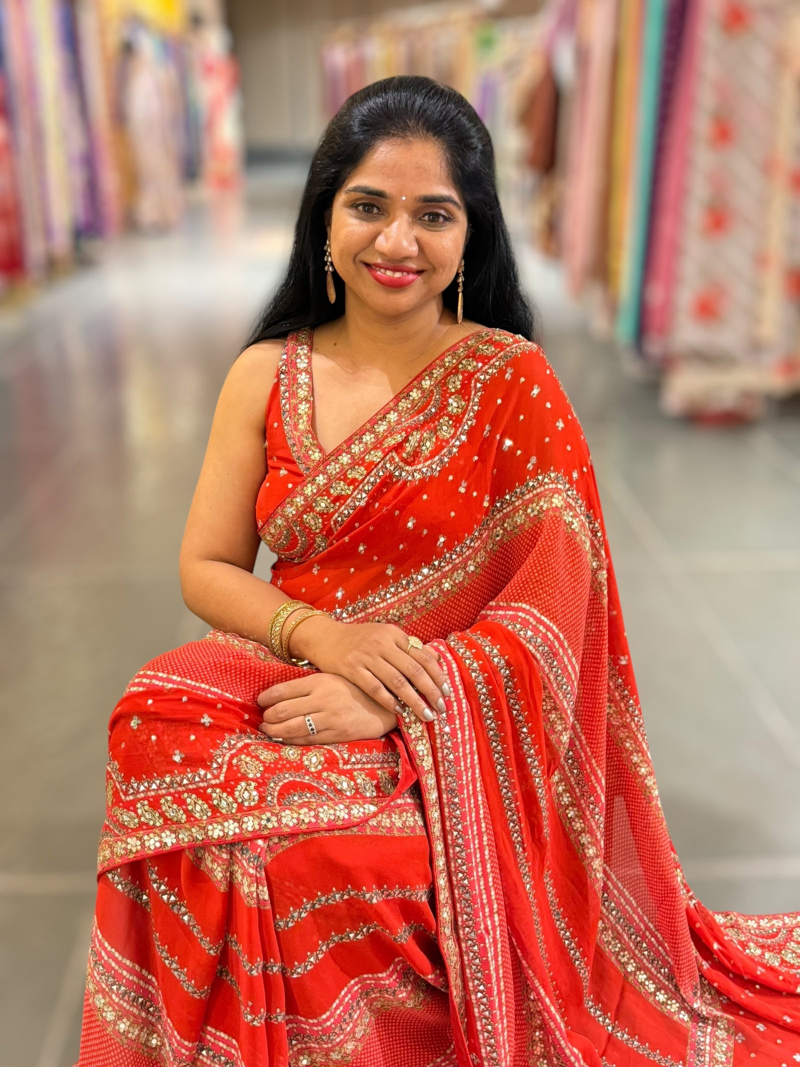 Orangish Red Kareena Inspired Gorgette Saree with allover mirrors