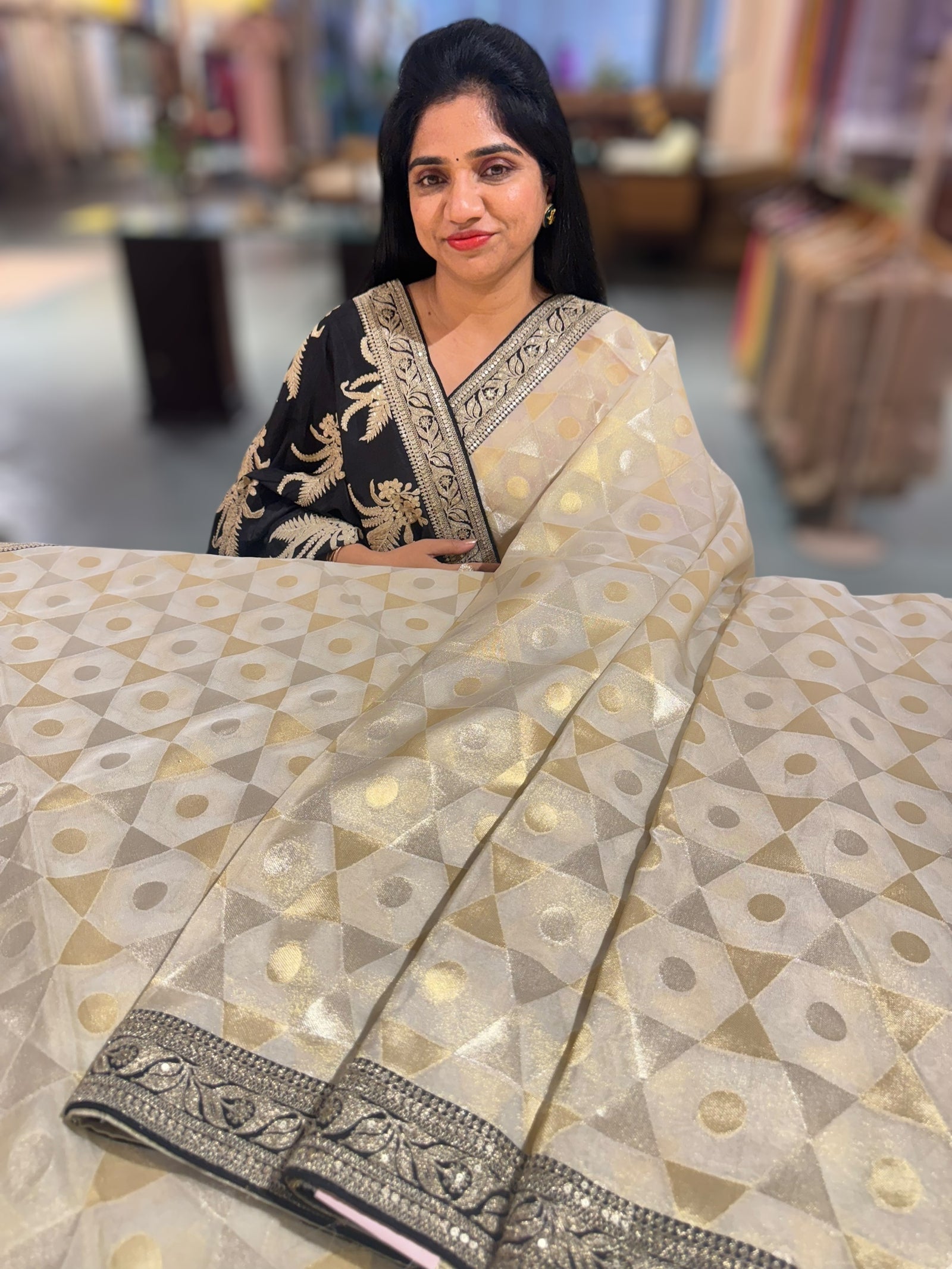 Beige Tissue Saree with Black Sabhyasachi borders