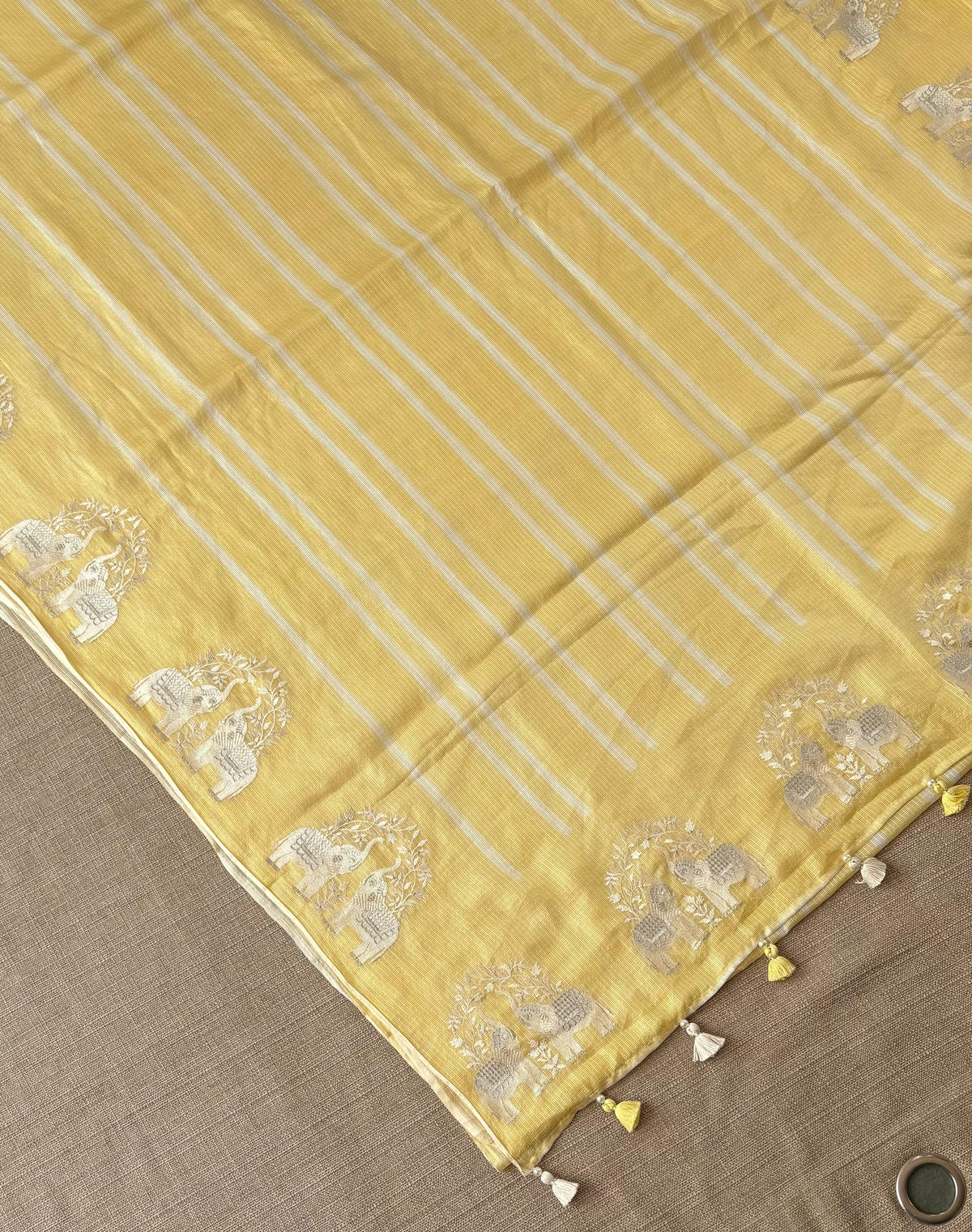 Pastel Yellow Designer Silk kota saree with elephant embroidered border