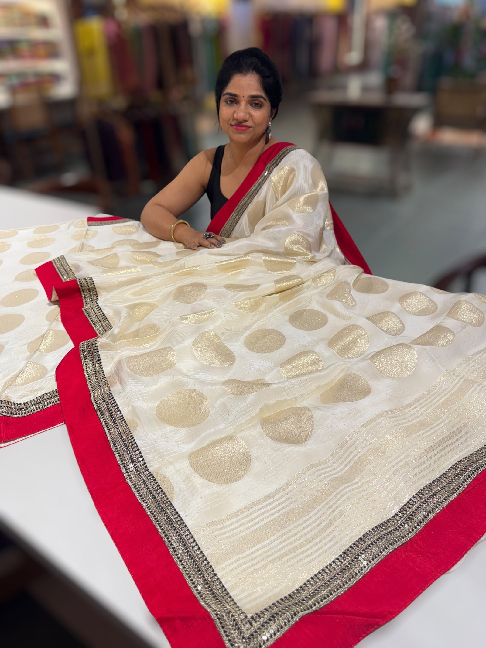 Half white Crepe Silk Polka dot Saree with sabhyasachi Borders & Blouse