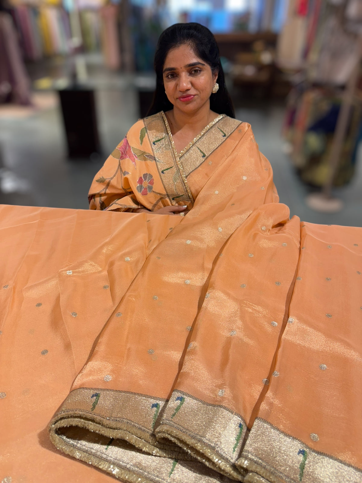 Peach Tissue Saree with pythani tissue embroidered border