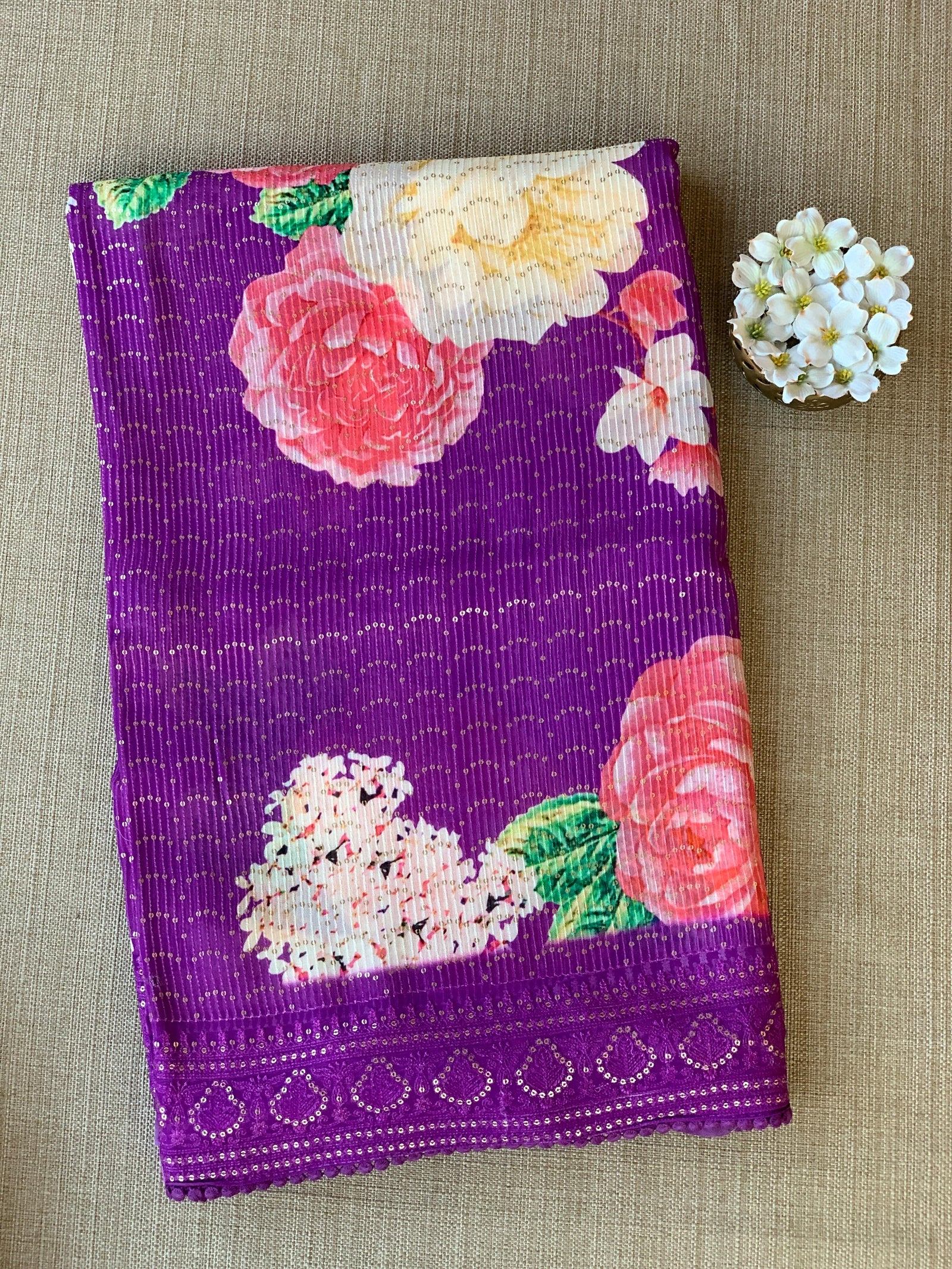 Purple georgette sequence saree with statement floral print