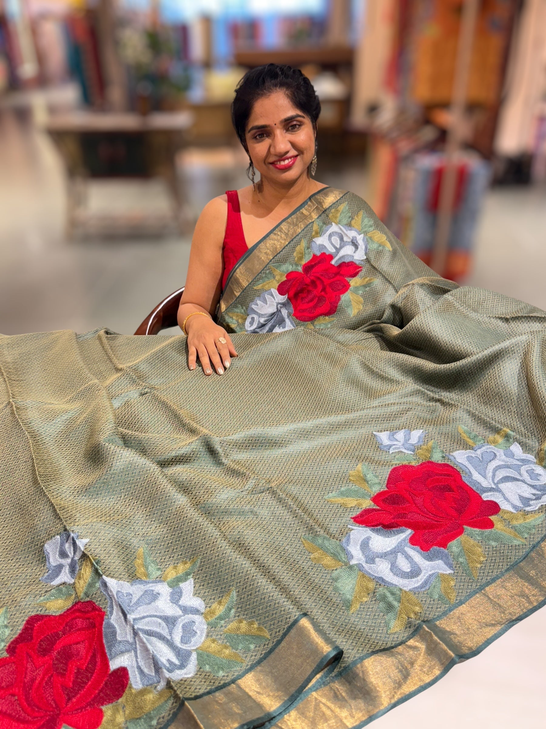 Sage Green Tussar Brocade Saree With Statement Red Rose Embroidery.