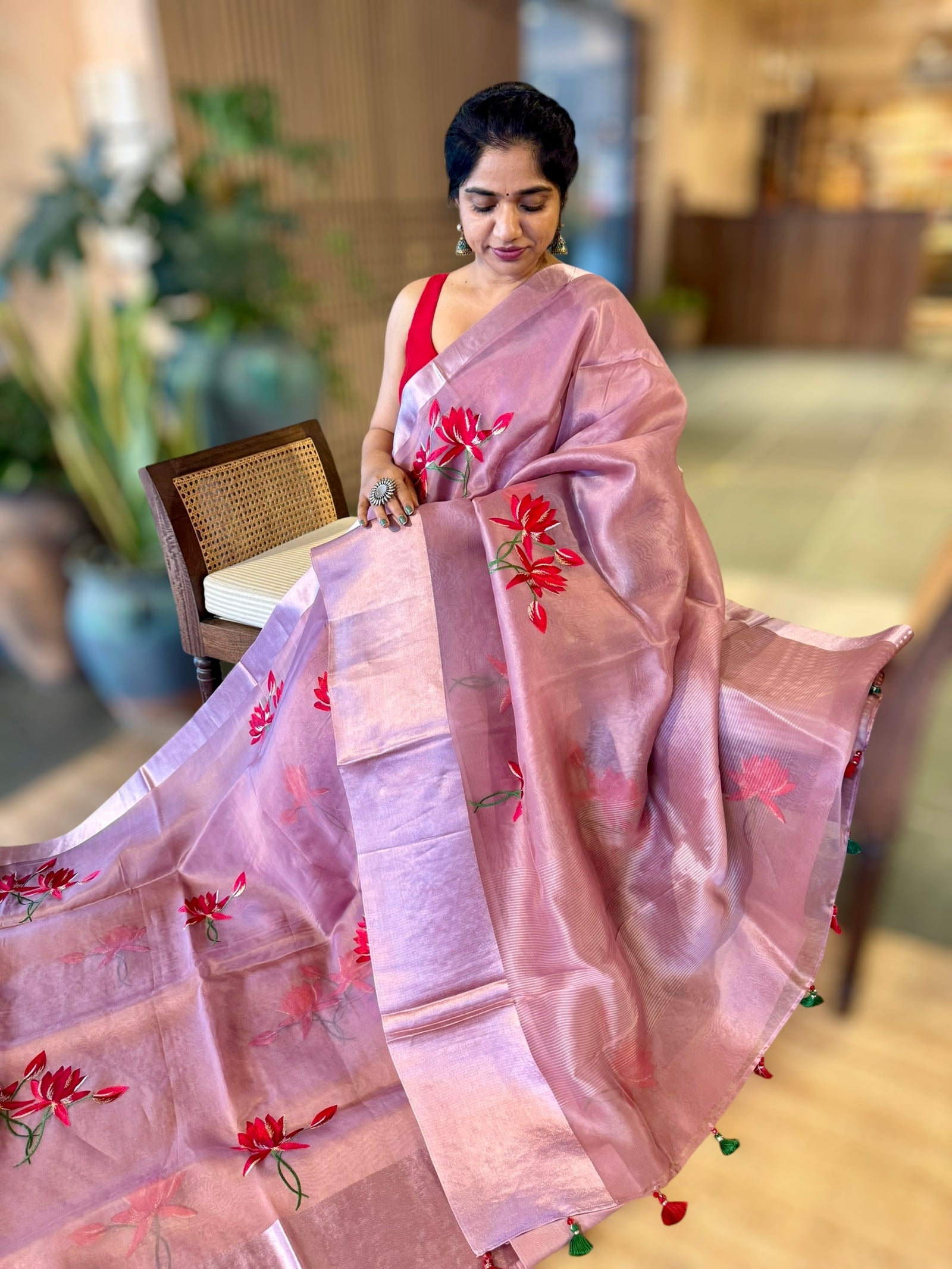 Mauve Organza Saree with Lotus flower embroidery and Satin Borders.