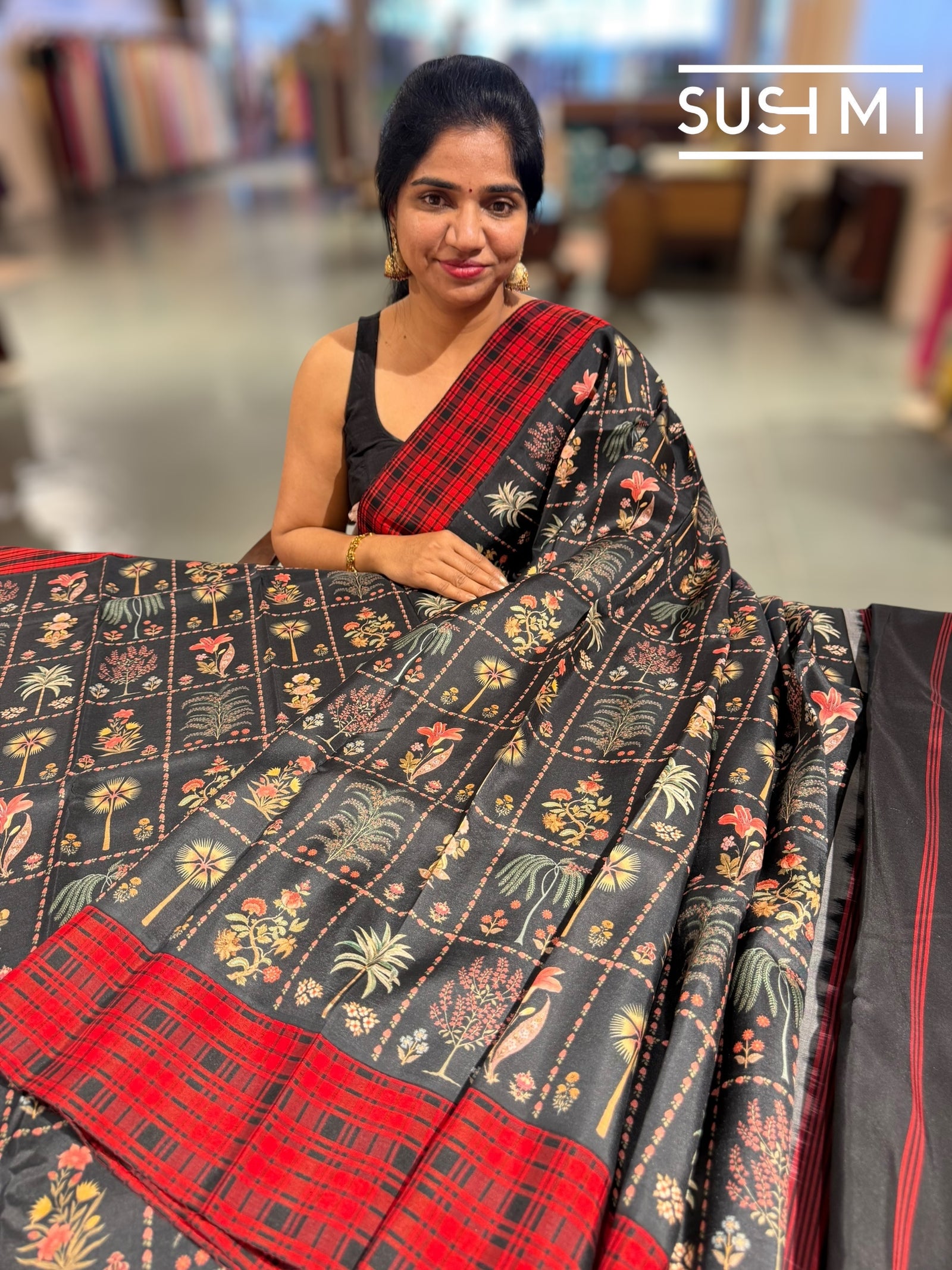 Black printed soft silk saree with burberry checks border : D62F035