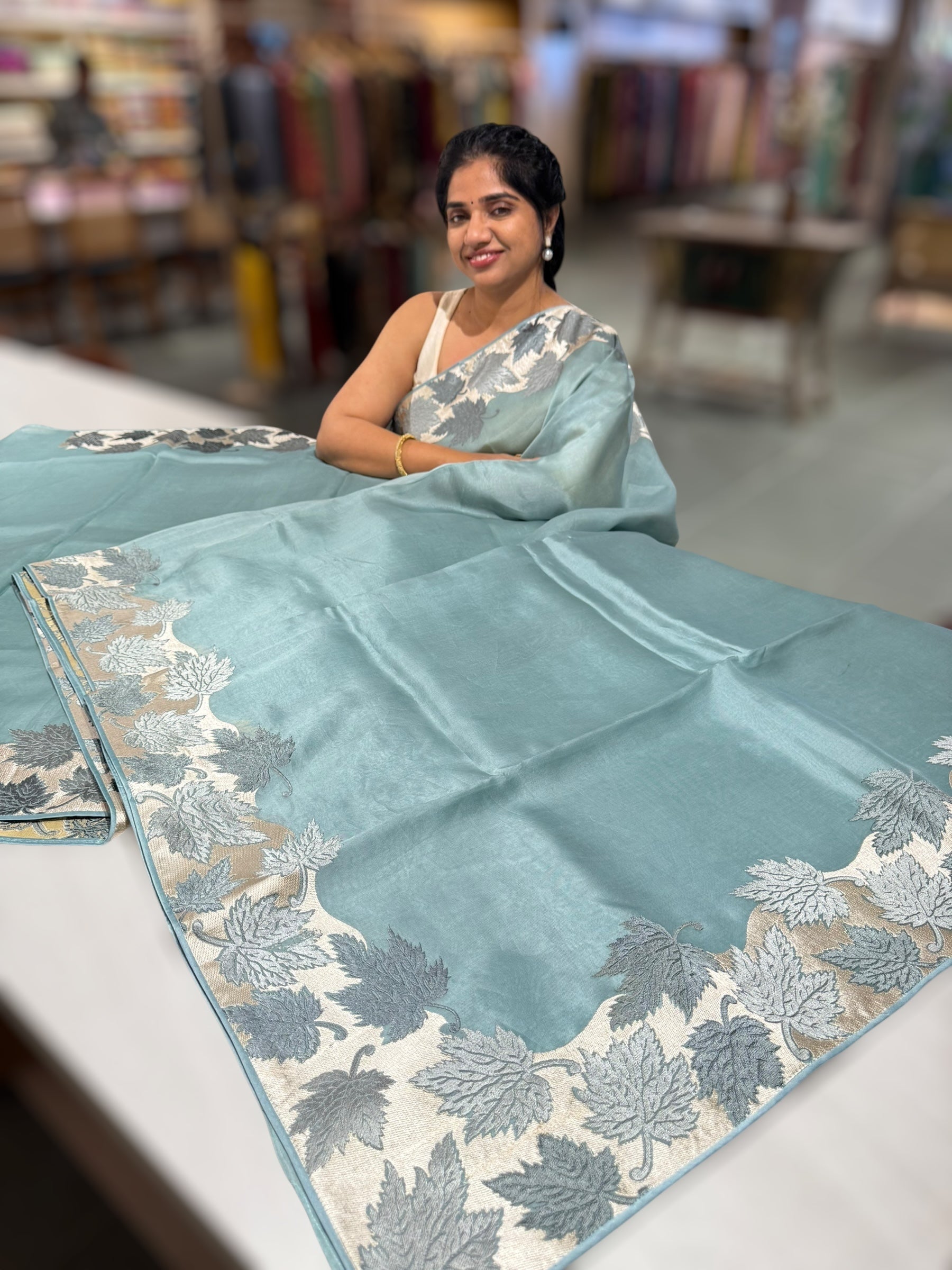 Dark Powder Blue Organza Saree with Stunning Leaf Embroidered Border