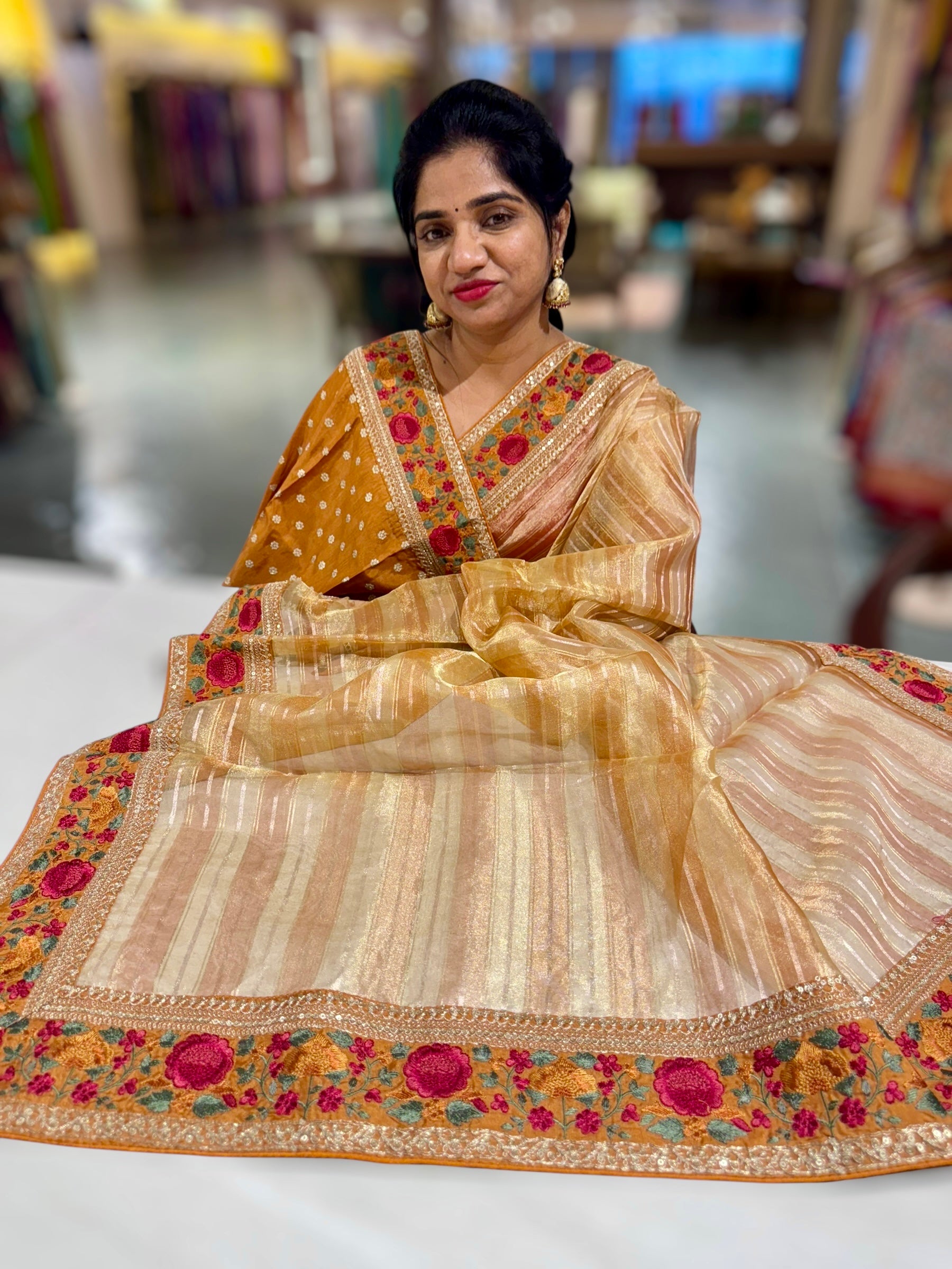 Light Orange Kora Tissue Stripes Saree with Sabhyasachi Style Embroidered Borders & Blouse