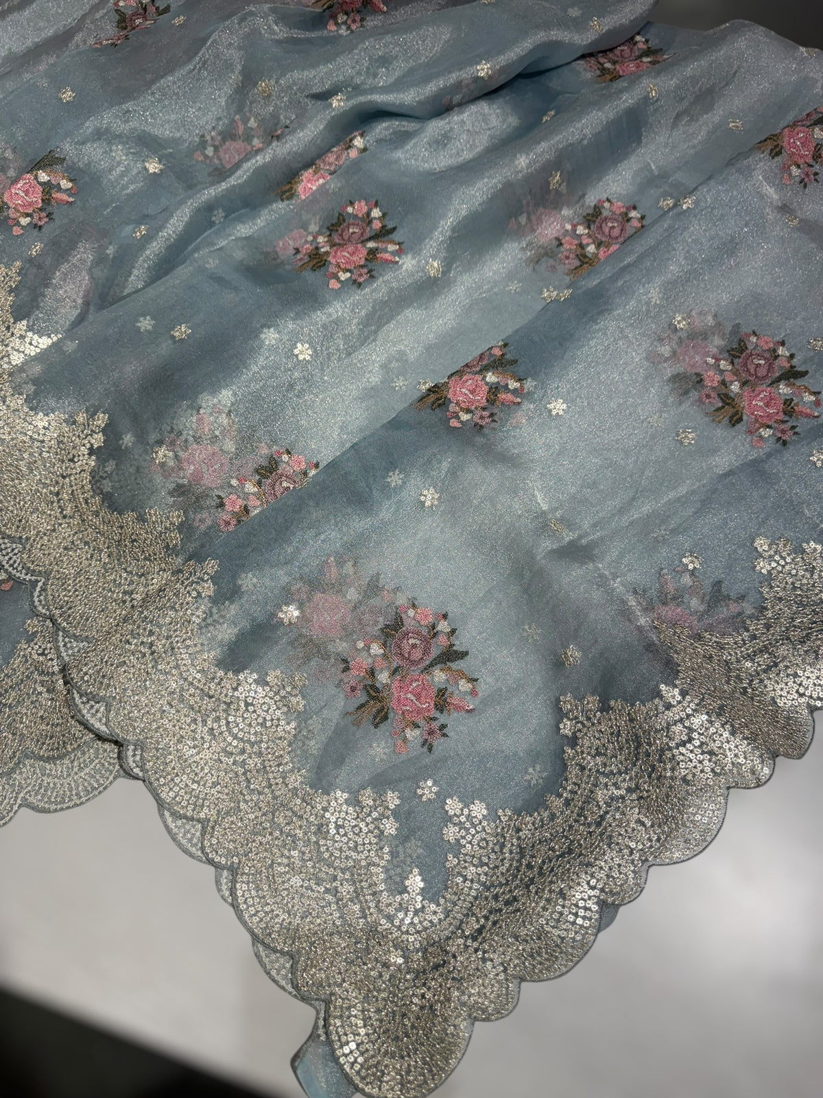 Pastel Blue Tissue Saree With allover Petite Point Motifs & Pittai Sequence Borders