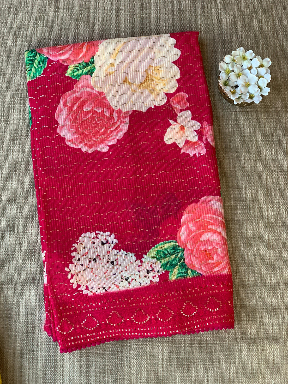 Reddish Pink georgette sequence saree with statement floral print