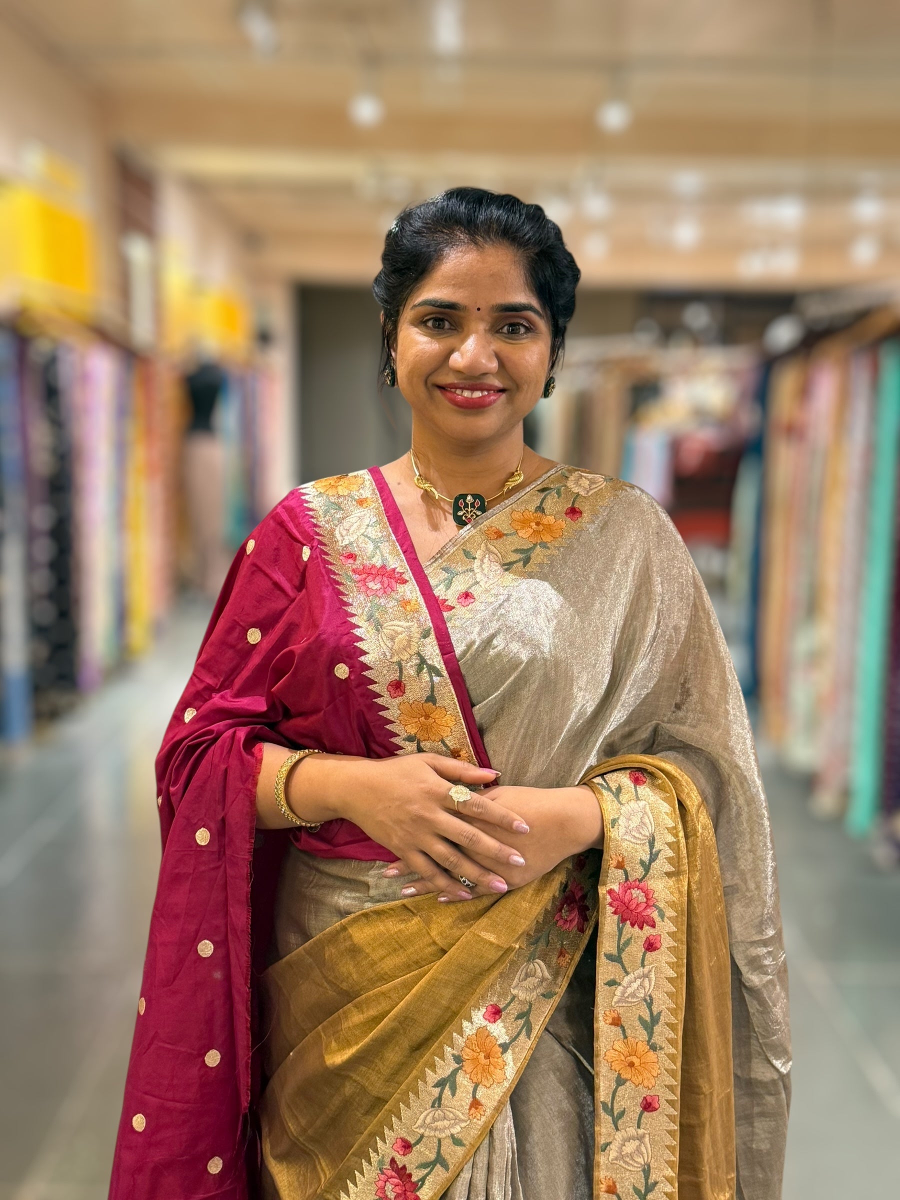 Handloom Tissue Saree with Paithani inspired embroidered border.