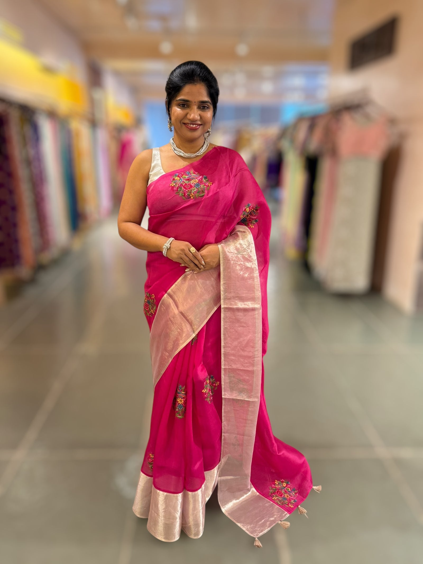 Rani Pink Organza Saree with pure Tissue Border