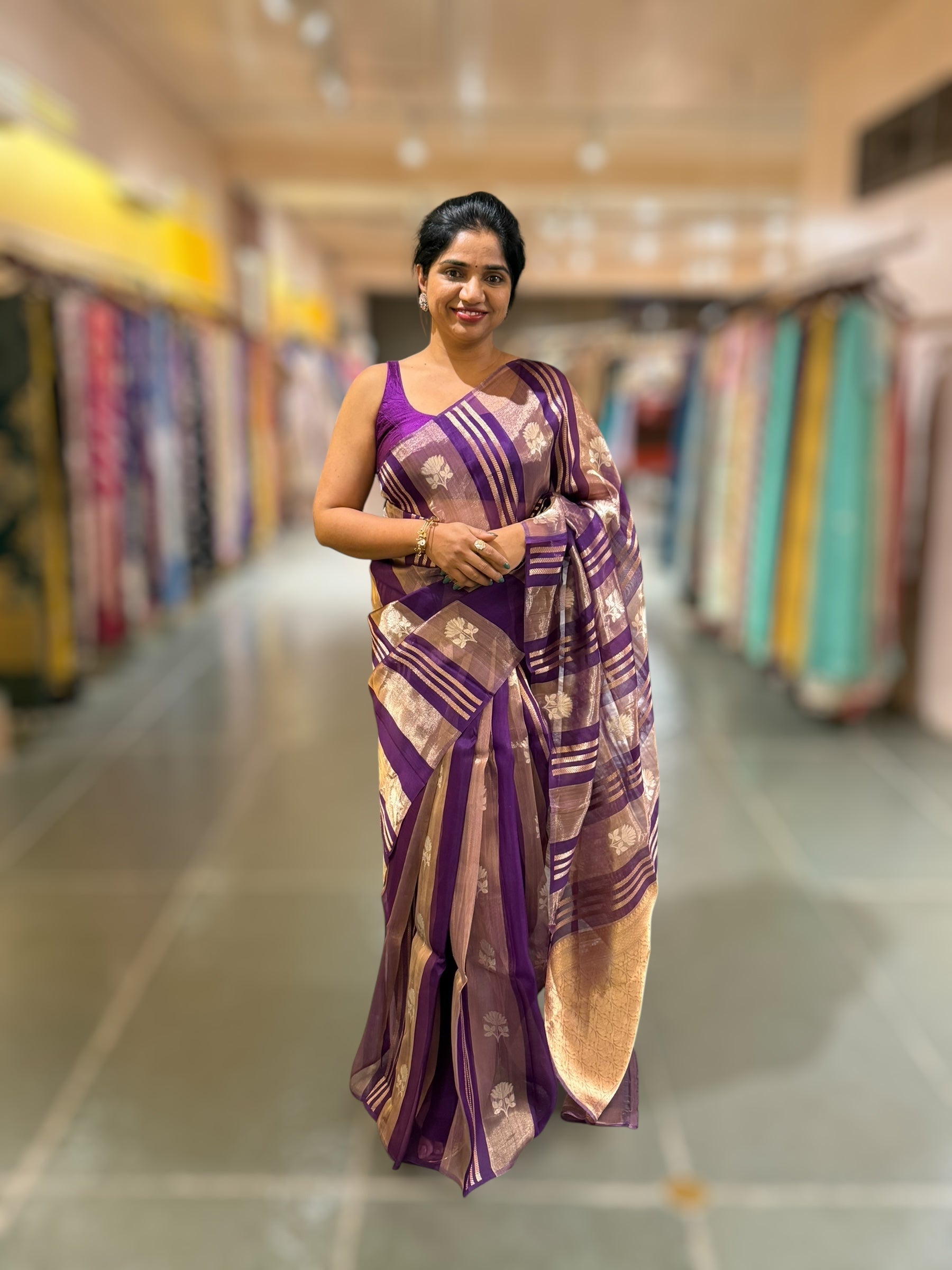 Purple Banarasi Handloom Kora Tissue Stripes with allover kaduwa woven lotus  motifs .