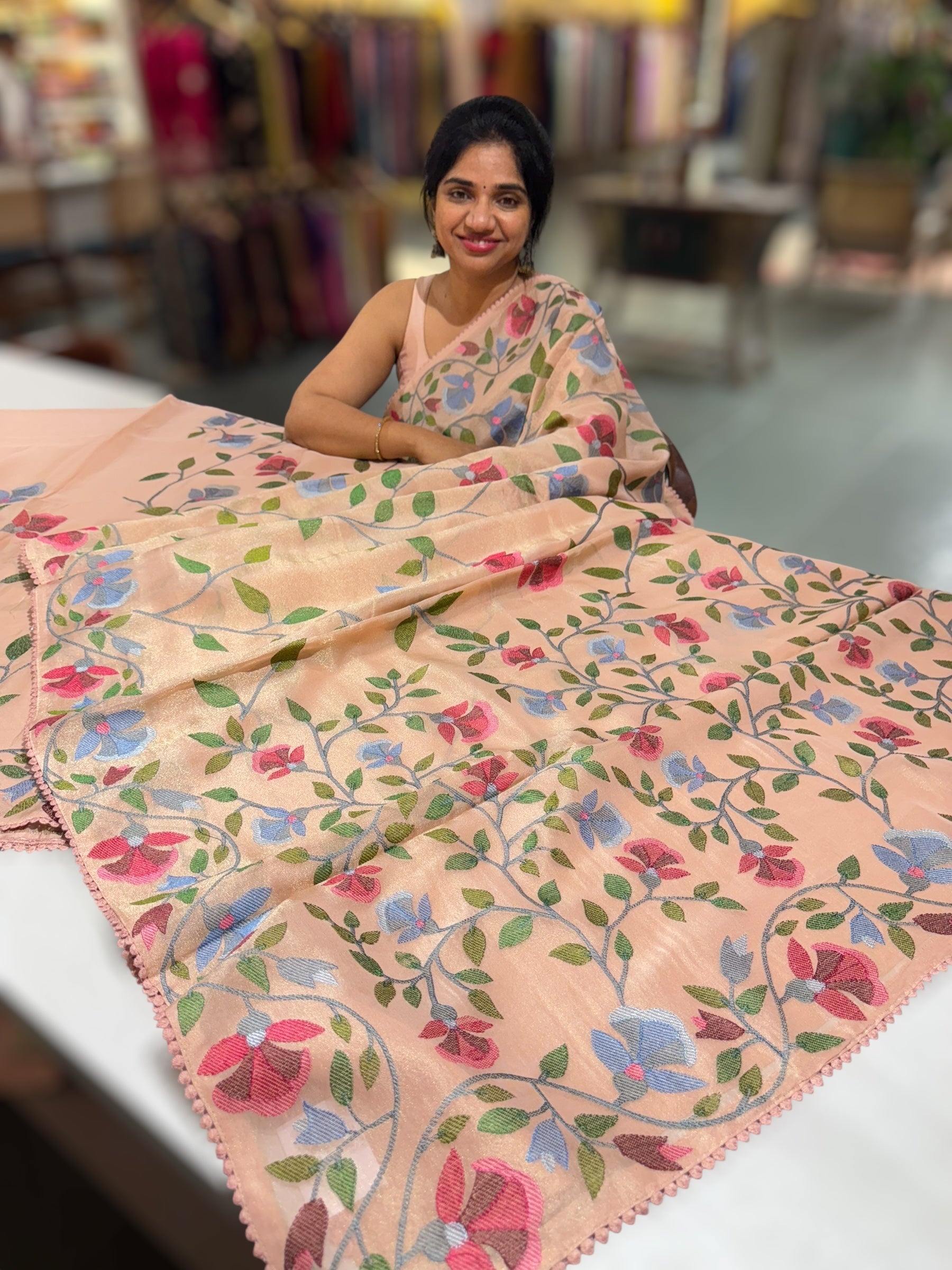 Peach Tissue georgette saree with allover jamdani inspired embroidery