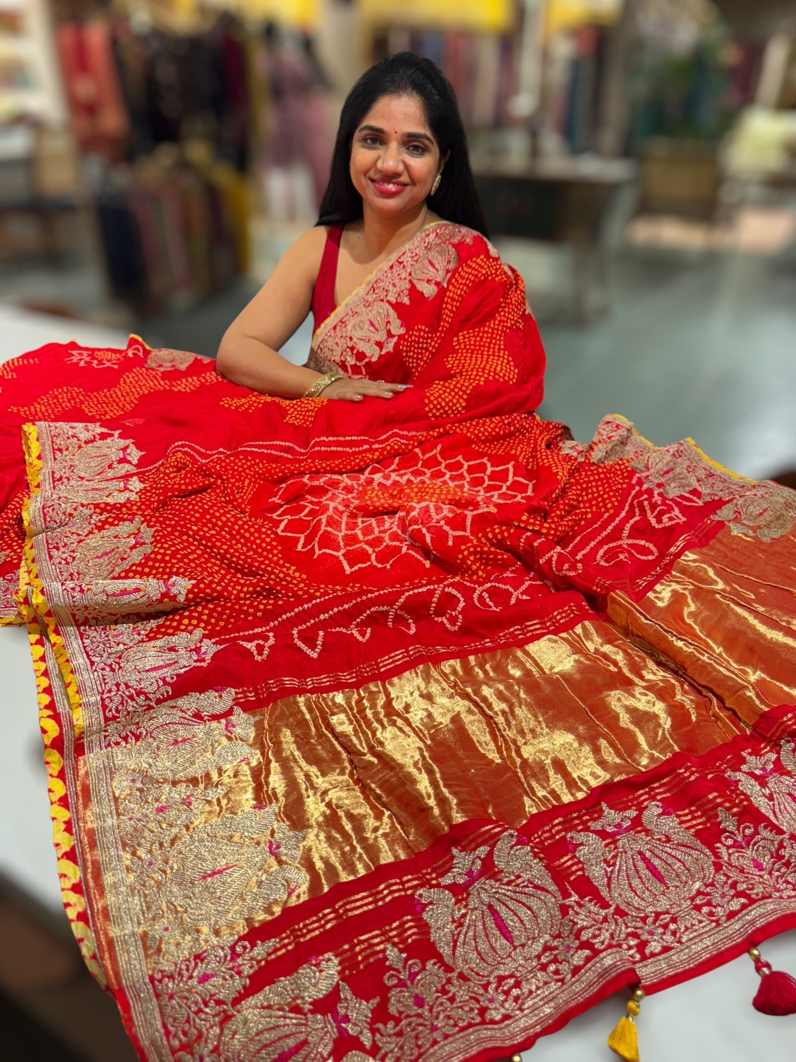 Orangish Red Designer Rai Bandhej Saree With Embroidered Border