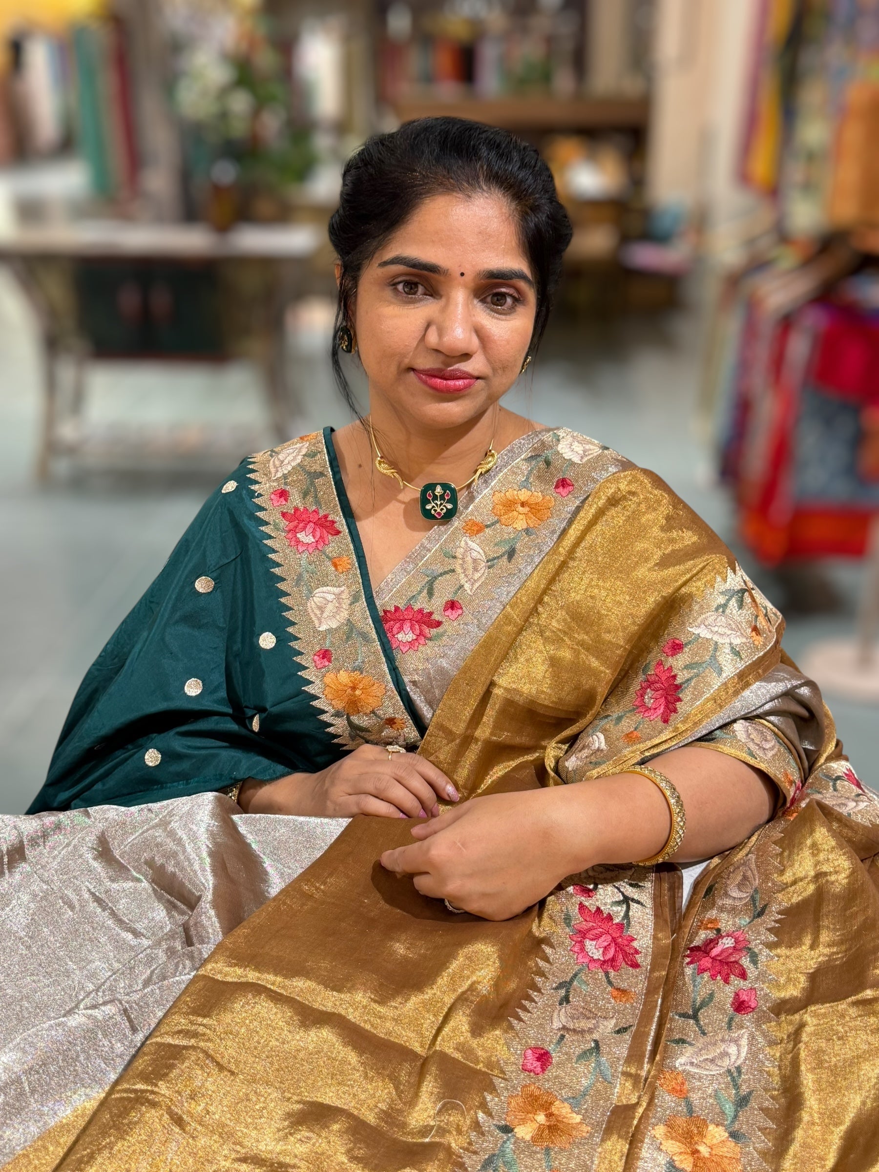 Handloom Tissue Saree with Paithani inspired embroidered border.