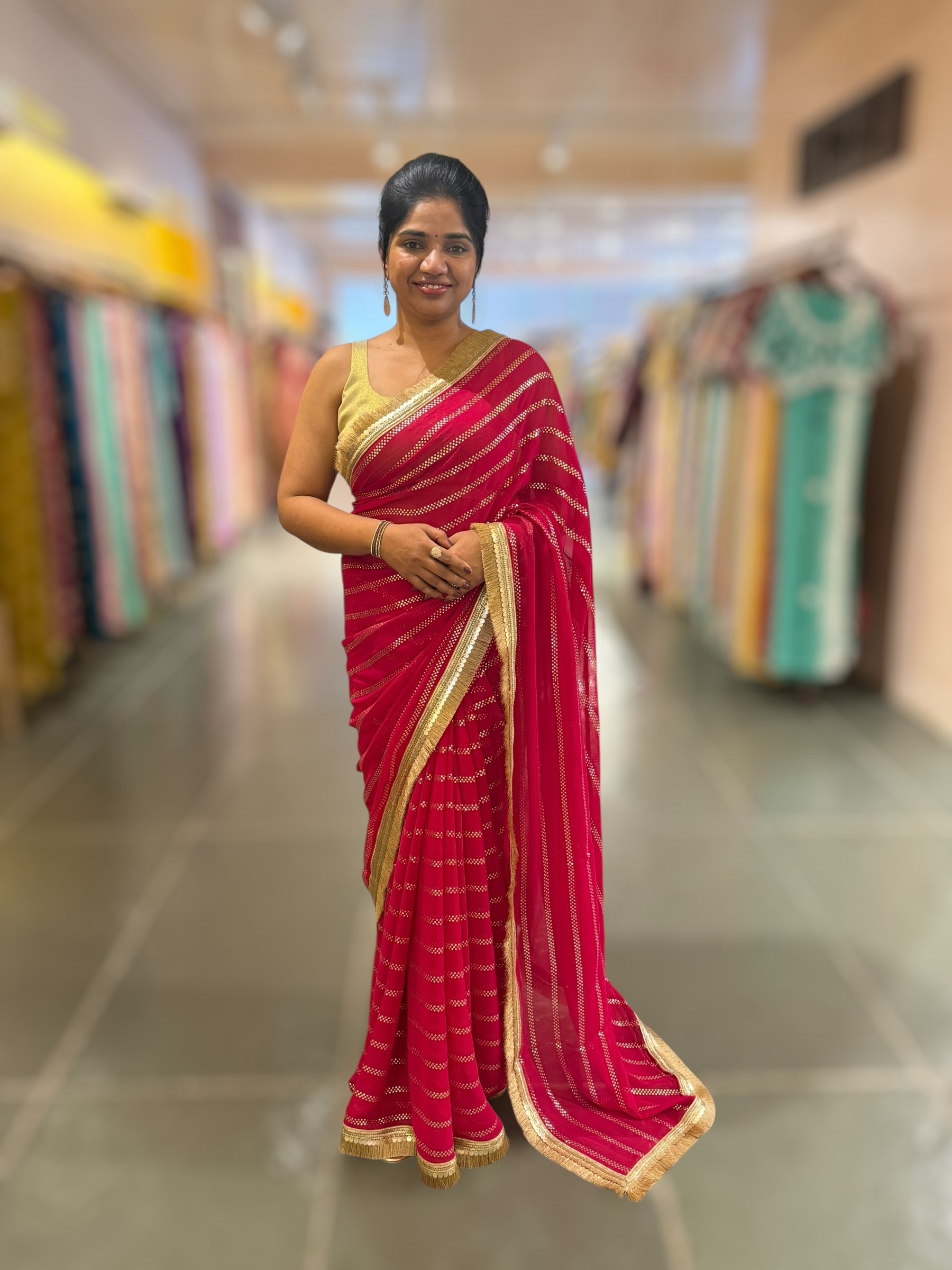 Dark Pink Georgette Saree with stick on Badla in stripes pattern and kiran Lace