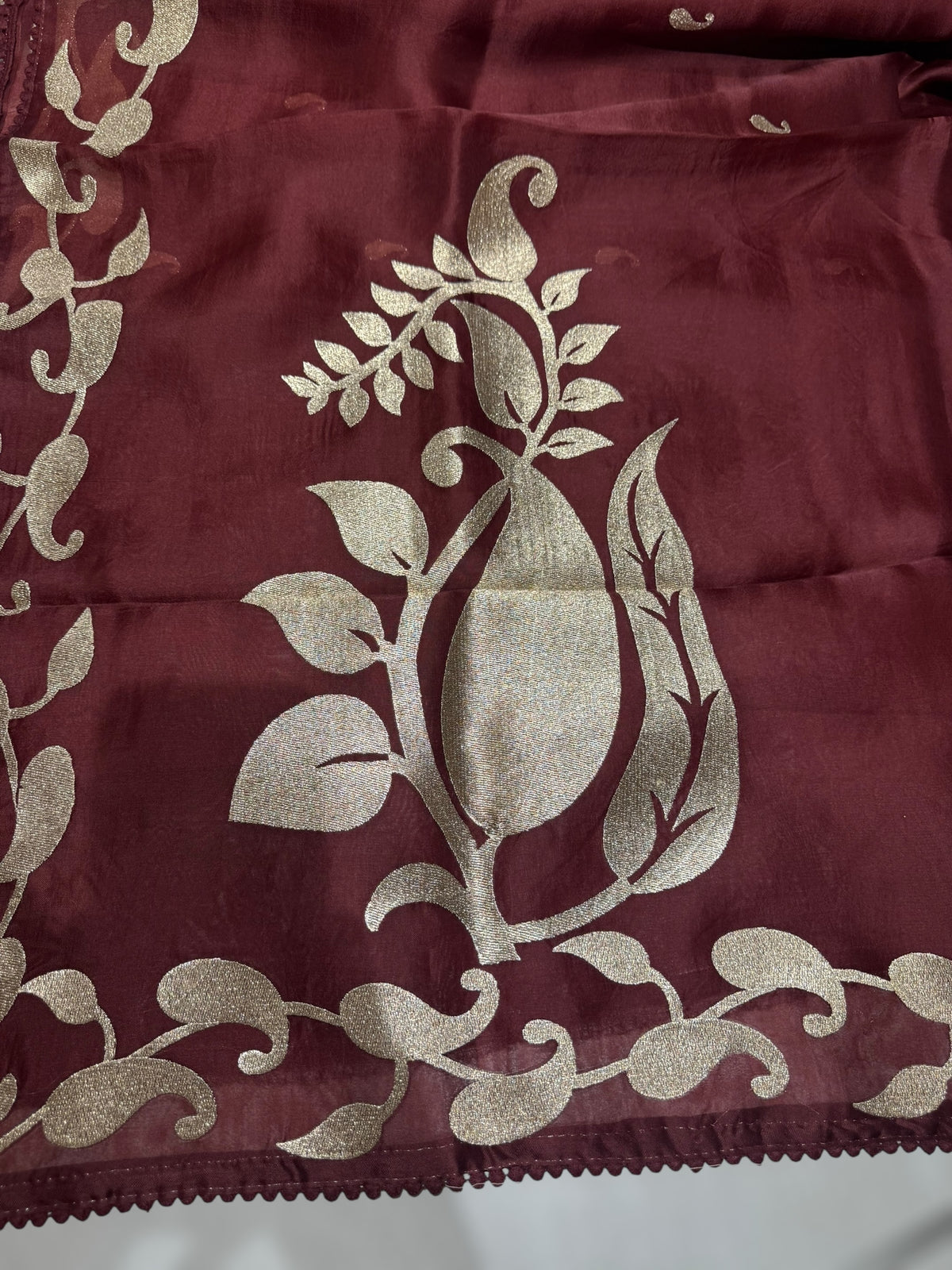 Meroonish Brown Organza Saree with stunning zari embroidered mango border and heavy designer pallu