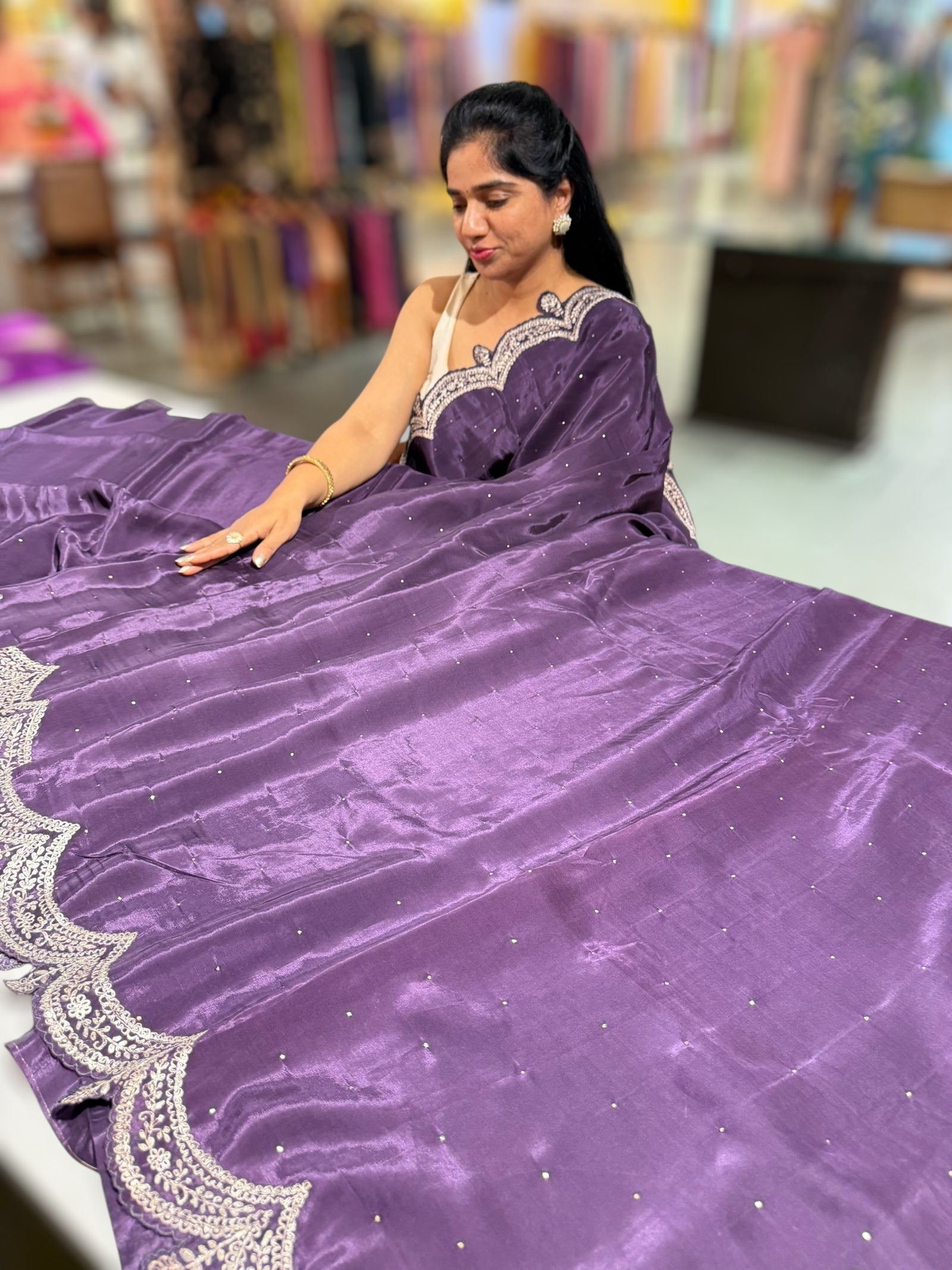 Plum crepe silk saree with scalloped pita border